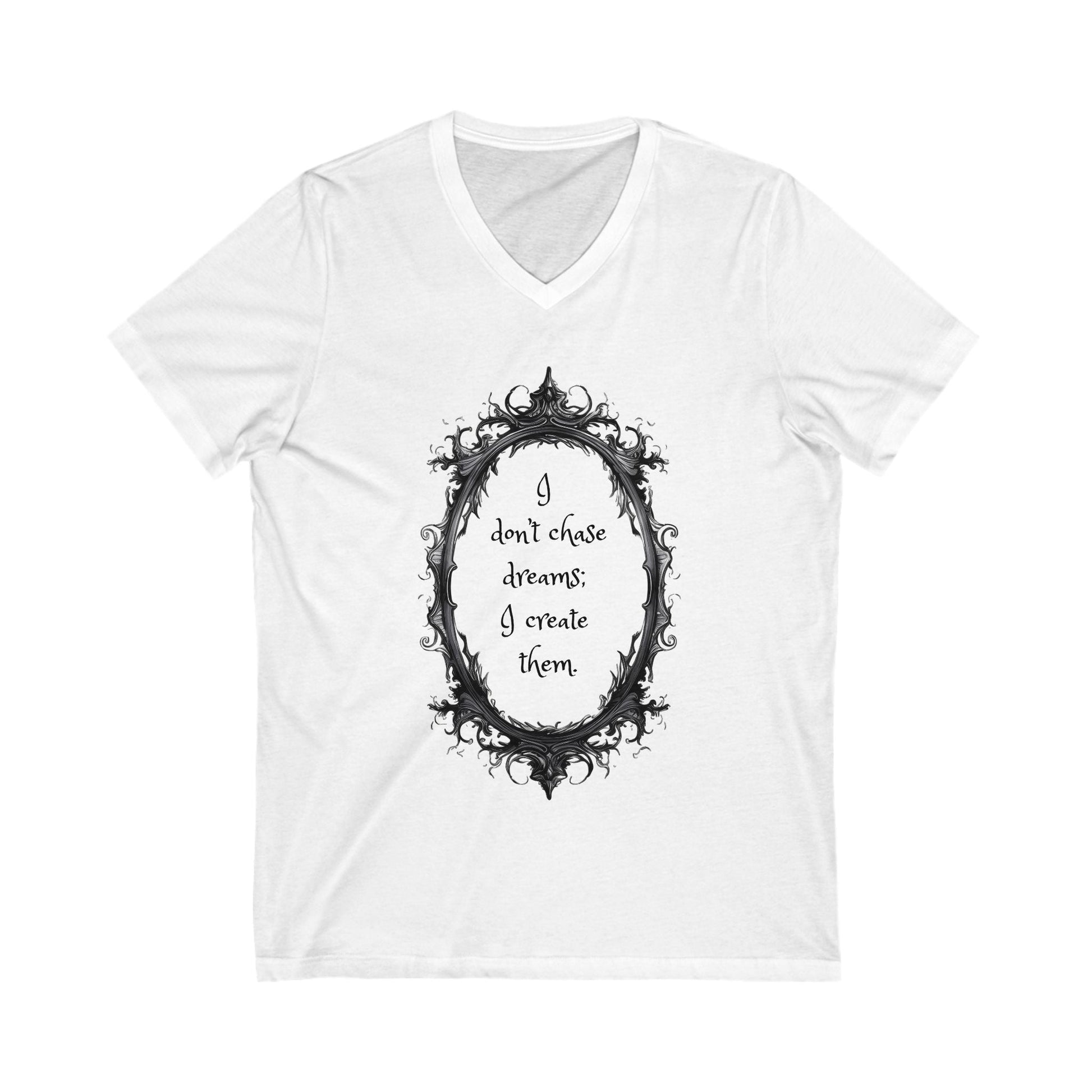 White unisex V-neck tee with inspirational quote "I don't chase dreams; I create them" inside ornate black frame design.