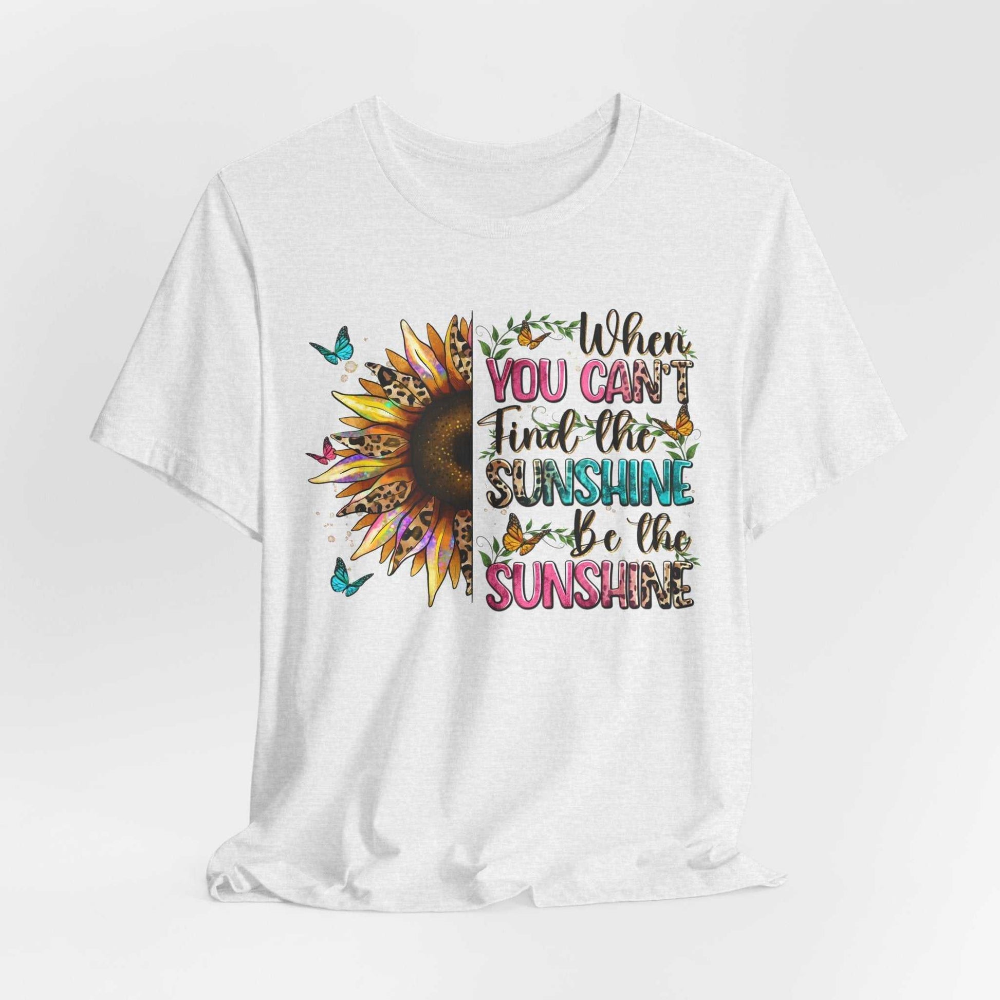 White Sunshine Quote Tee with colorful sunflower and butterfly graphic and motivational text design