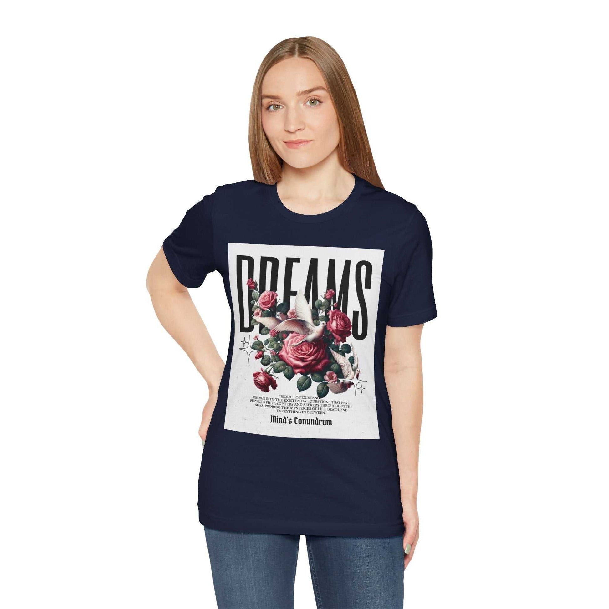 Woman wearing navy Dreams Floral Tee with large floral and text graphic on front