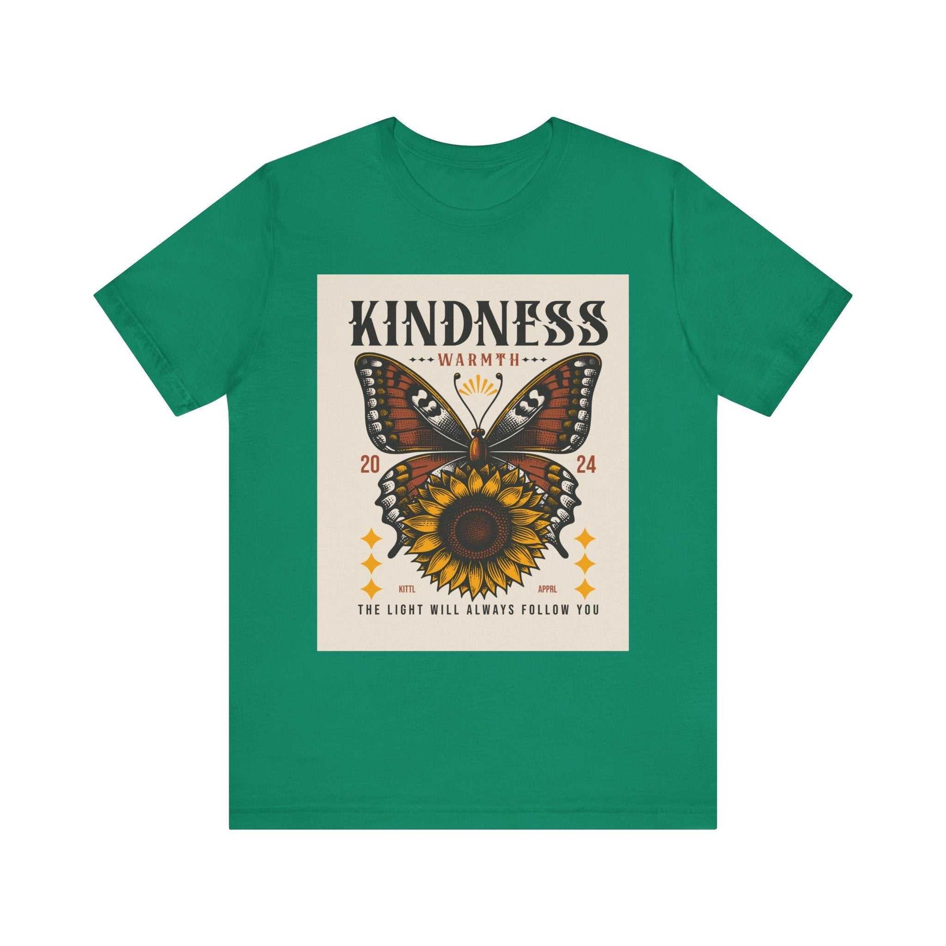 Green Kindness Butterfly Tee featuring a butterfly and sunflower design with the text "Kindness Warmth 2024 The light will always follow you"