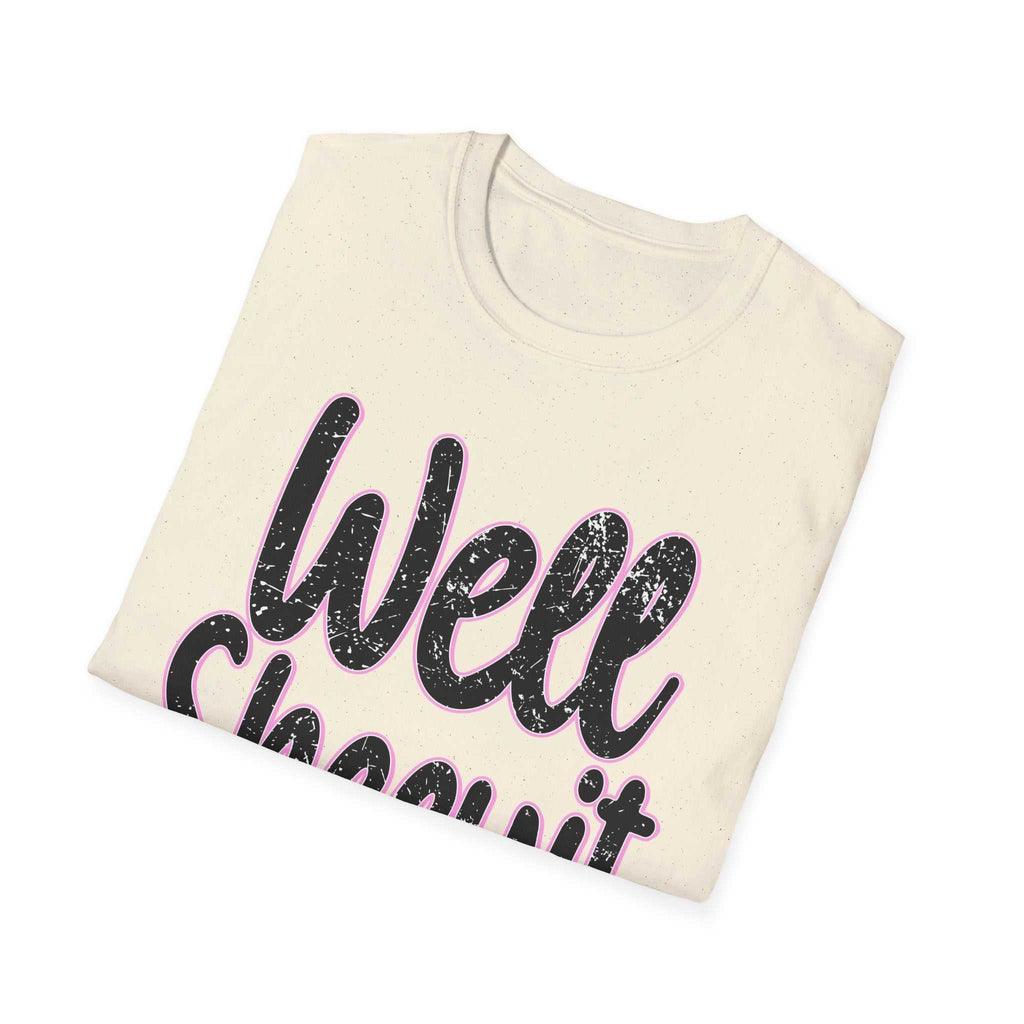 Folded casual statement tee with funny "Well Sheeyit" quote printed on front in black and pink text