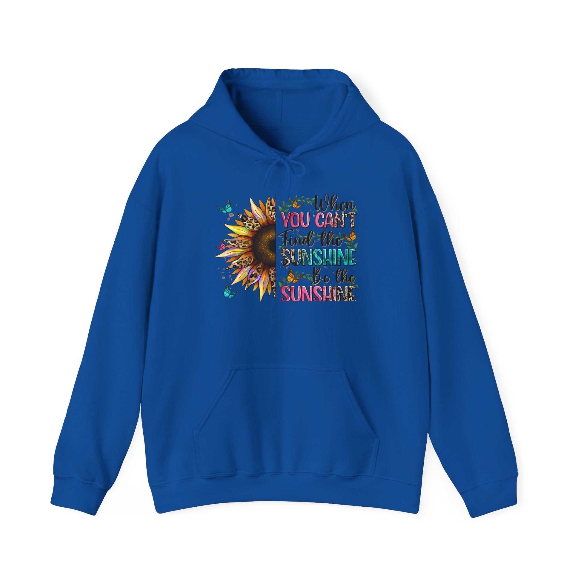 Blue hoodie with sunflower design and inspirational quote "When you can't find the sunshine be the sunshine" on front