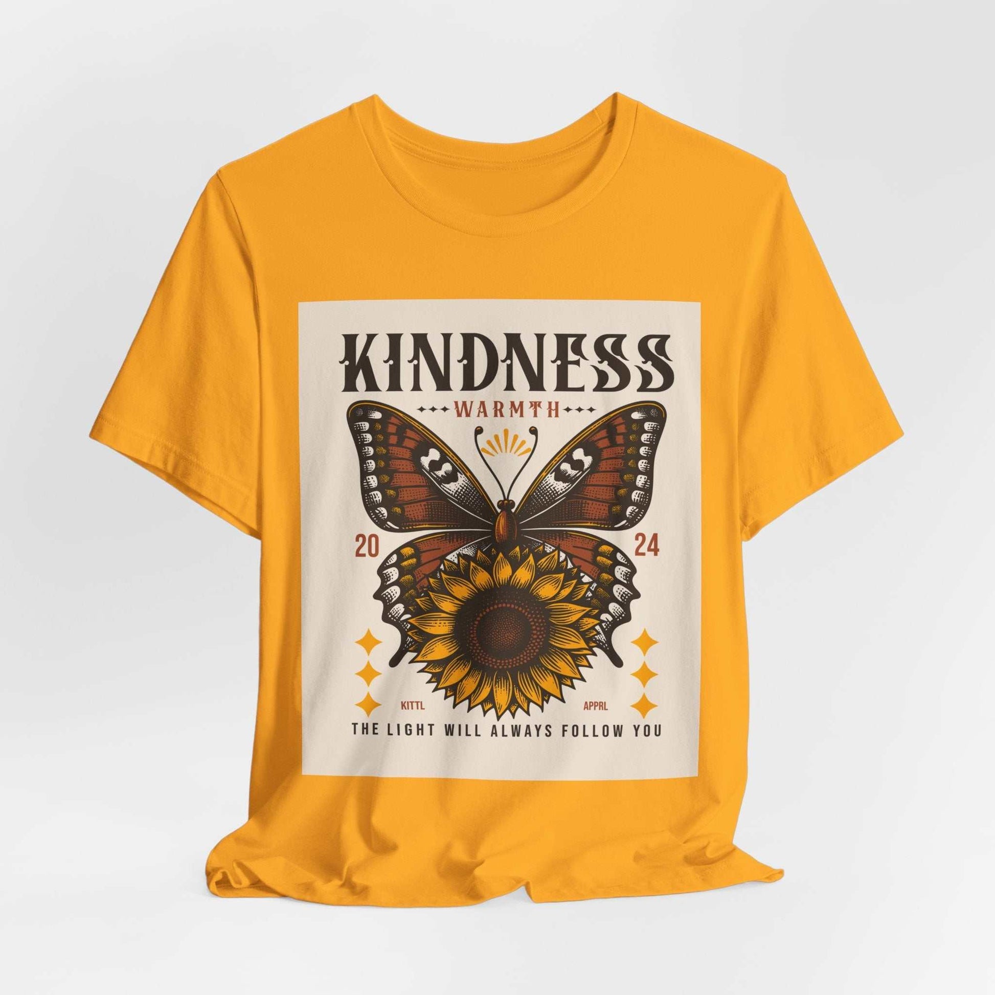 Yellow Kindness Butterfly Tee with sunflower and butterfly graphic design promoting positivity and warmth