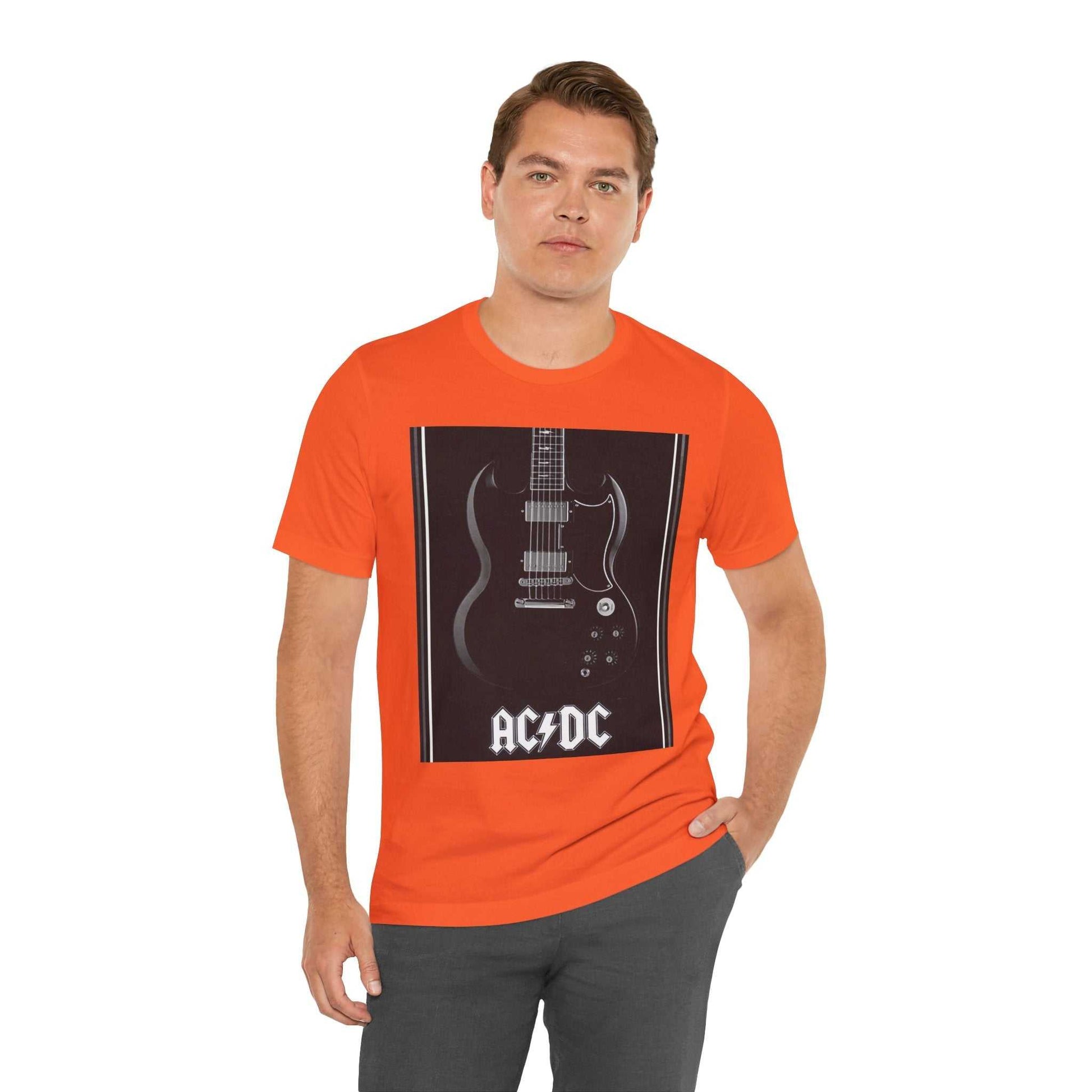 Man wearing orange rock guitar graphic tee with AC/DC design on front