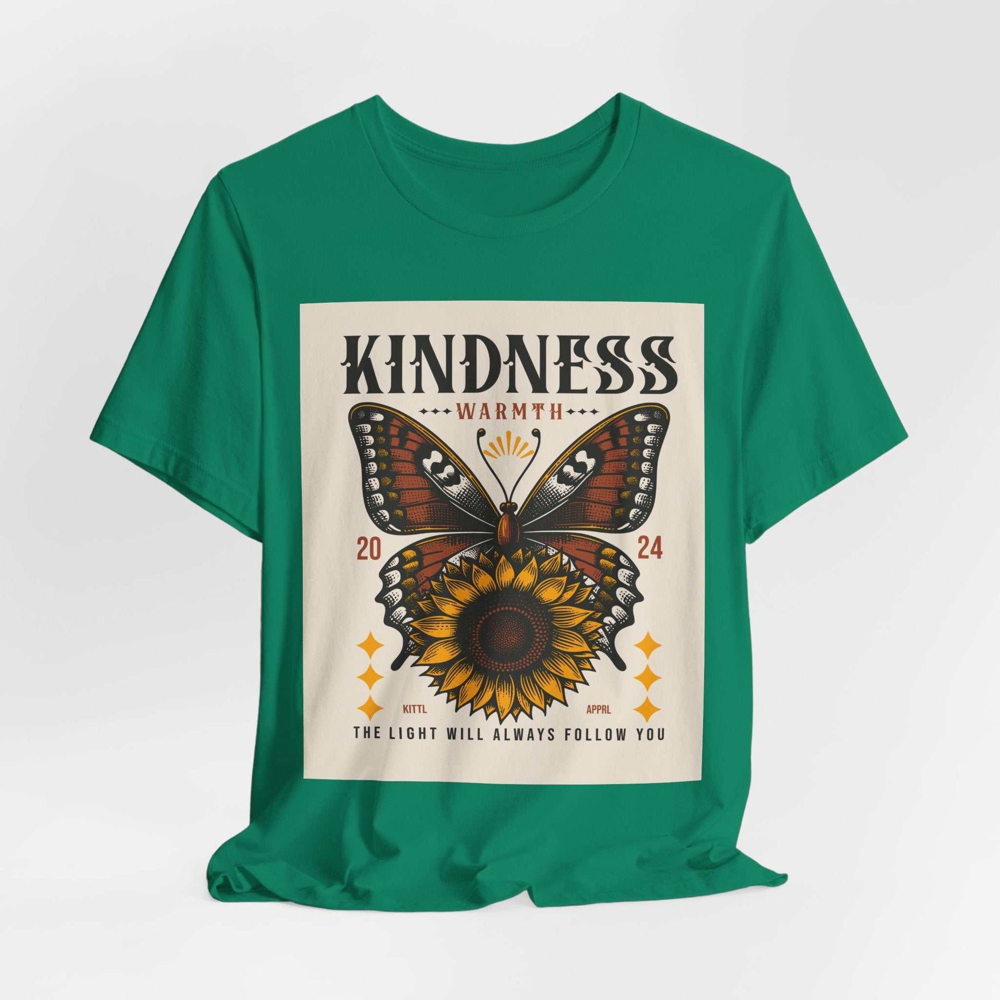 Green Kindness Butterfly Tee featuring a butterfly and sunflower graphic with inspirational text on front