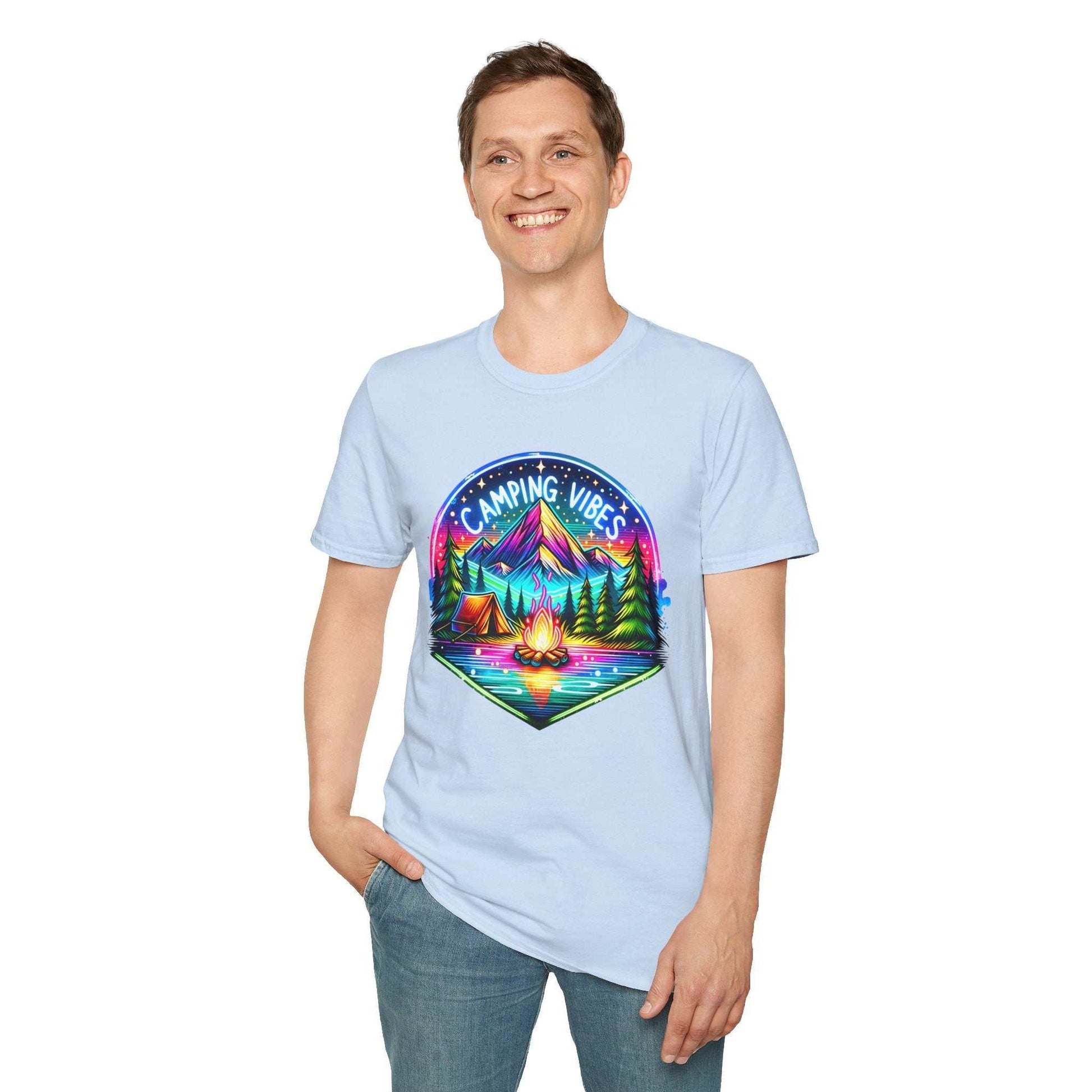 Unisex light blue softstyle t-shirt with colorful Camping Vibes graphic featuring mountains, tents, and campfire.