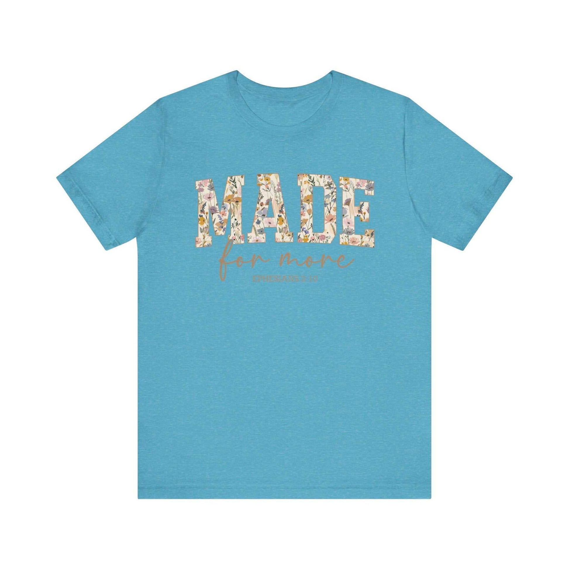 Blue "Made for More" unisex short sleeve tee with floral patterned text and comfortable fit