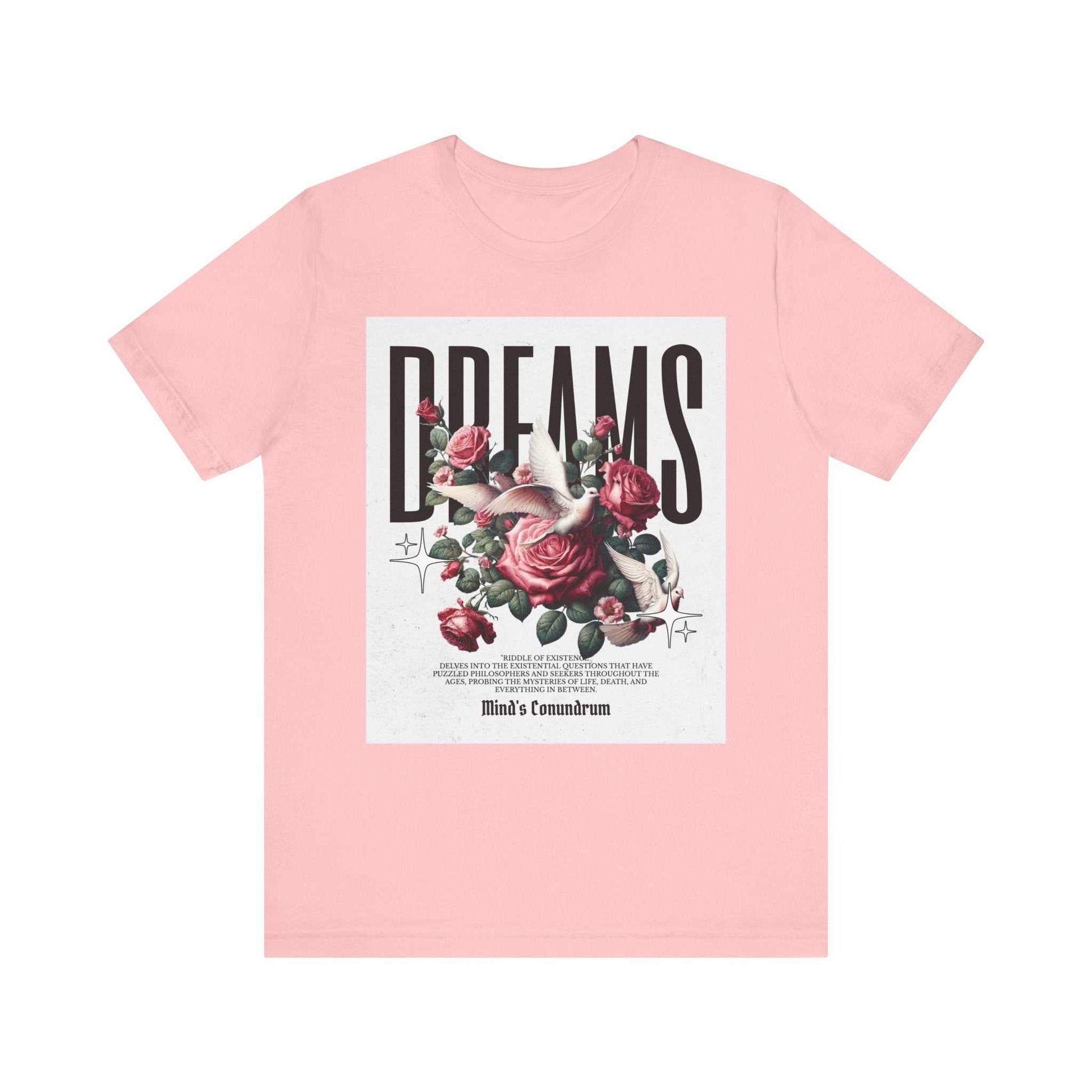 Pink unisex Dreams Floral Tee featuring bold typography and rose floral design on front.