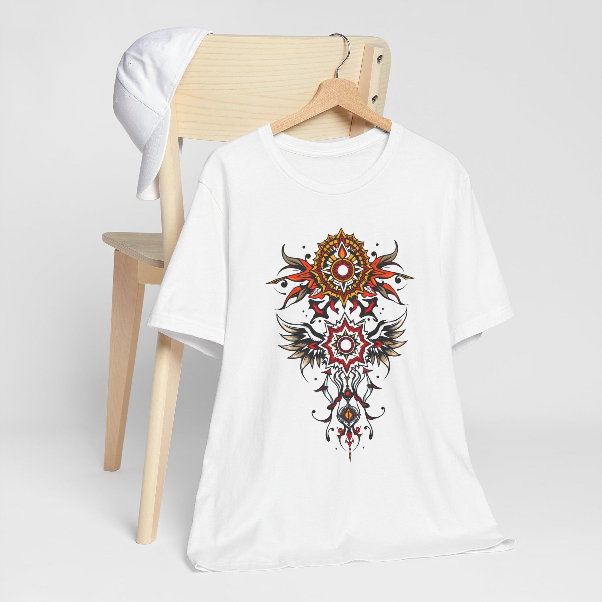 Turn heads in this tee, available in vibrant colors, showcasing a fiery red and gold tribal mandala for bold, artistic style