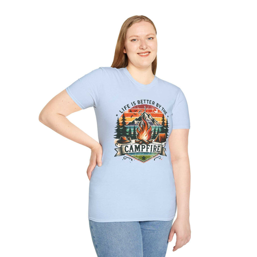Woman wearing light blue Camping Adventure Unisex T-Shirt with "Life is Better by the Campfire" and campfire graphic printed on front.