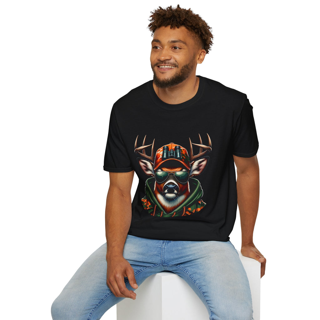 Man wearing black Hunting Enthusiast T-Shirt with deer graphic and casual jeans sitting on white block