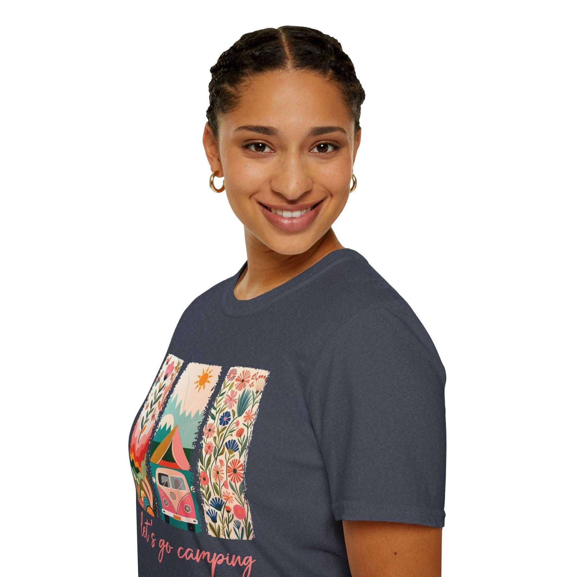Woman wearing navy unisex softstyle t-shirt featuring colorful camping adventure graphic design
