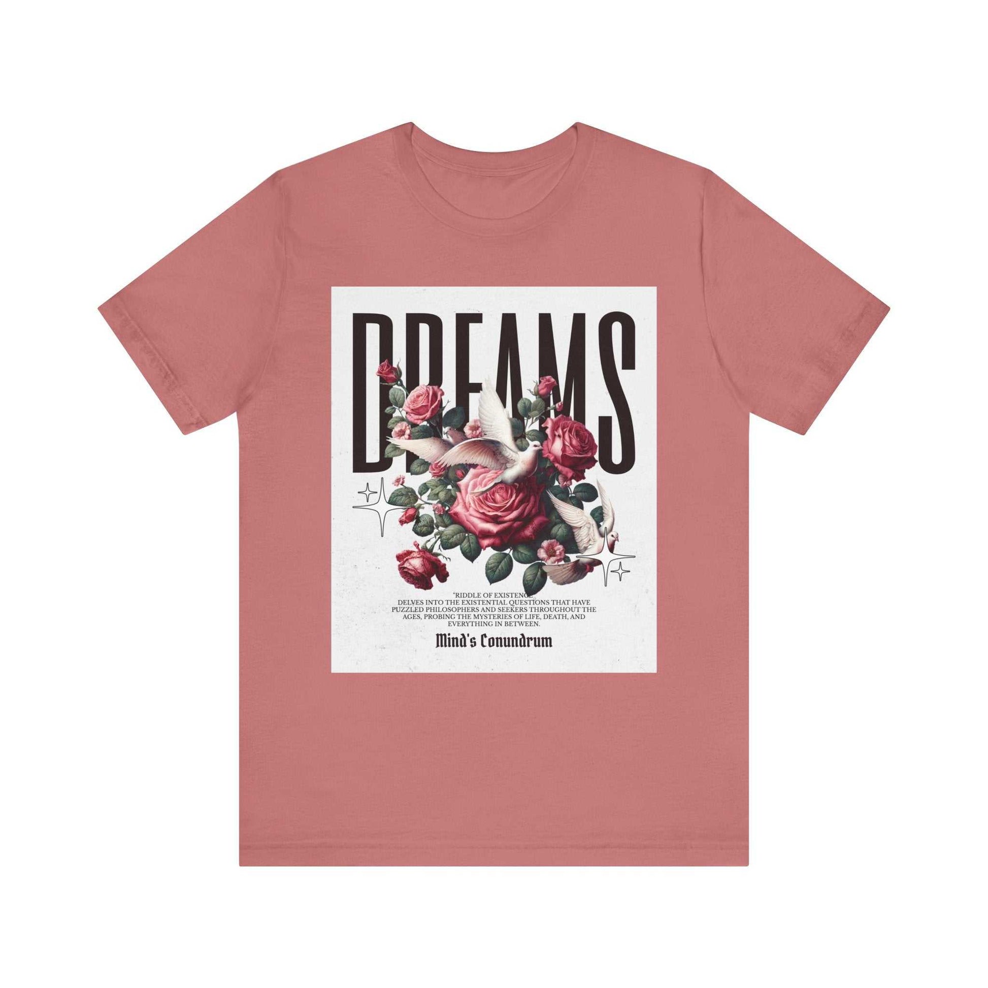 Unisex dusty rose Dreams Floral Tee with bold typography and rose floral graphic on front