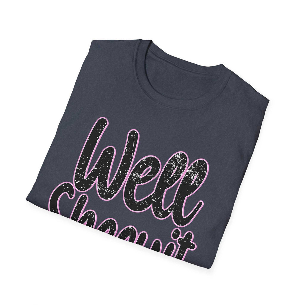 Folded casual statement tee in dark color with "Well Sheeyit" humorous text design in distressed style