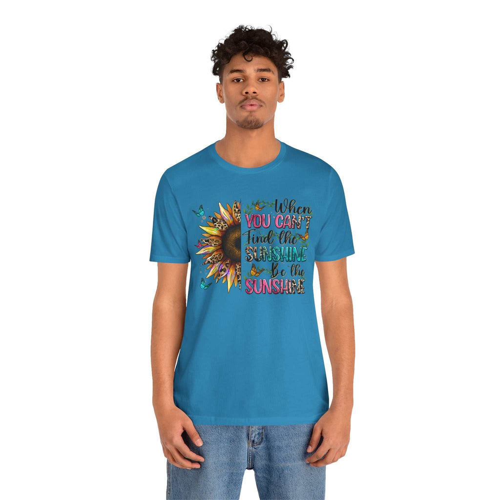 Blue Sunshine Quote Tee with sunflower and positive message printed, worn by male model