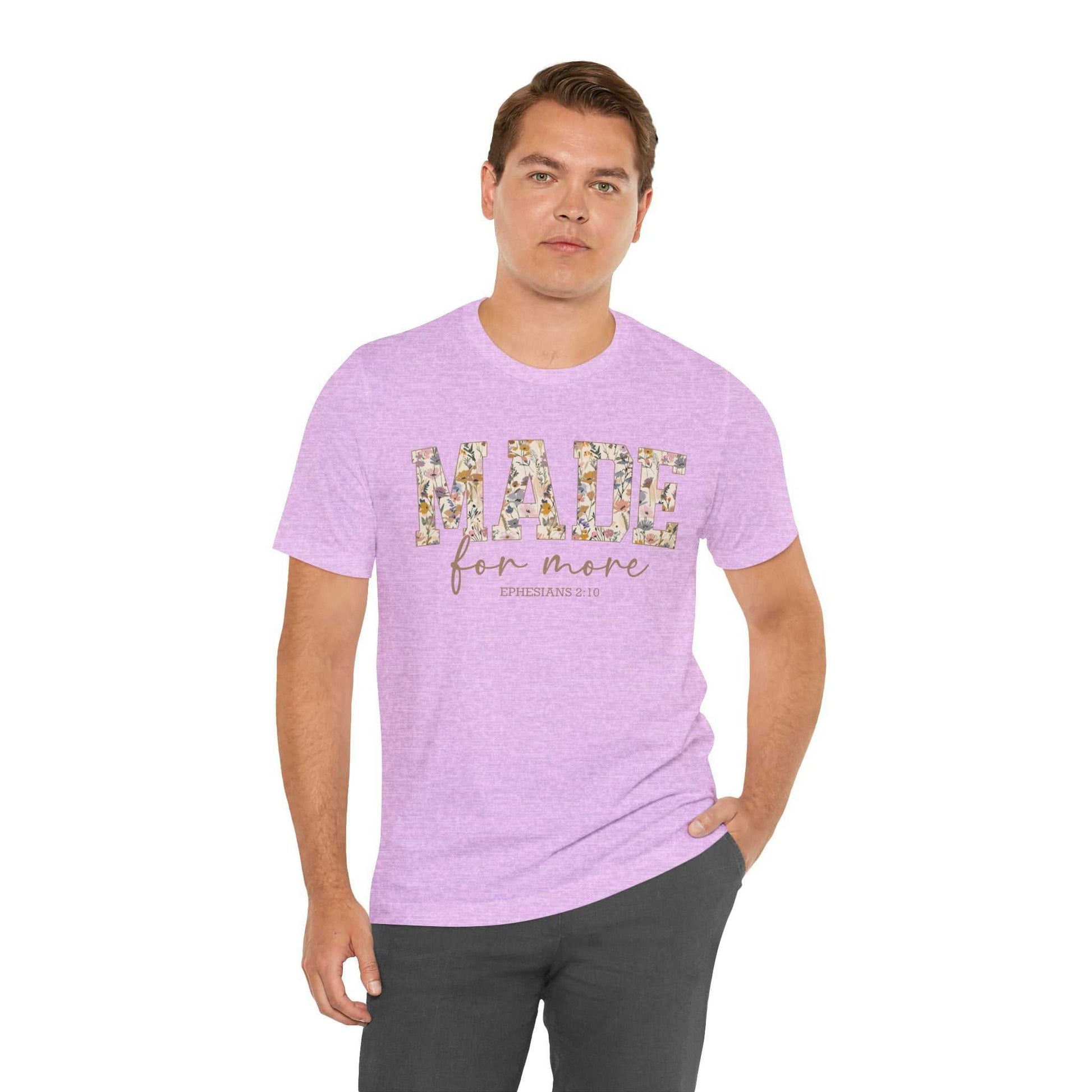 Man wearing lilac Made for More Tee with floral text design, casual fit unisex cotton shirt