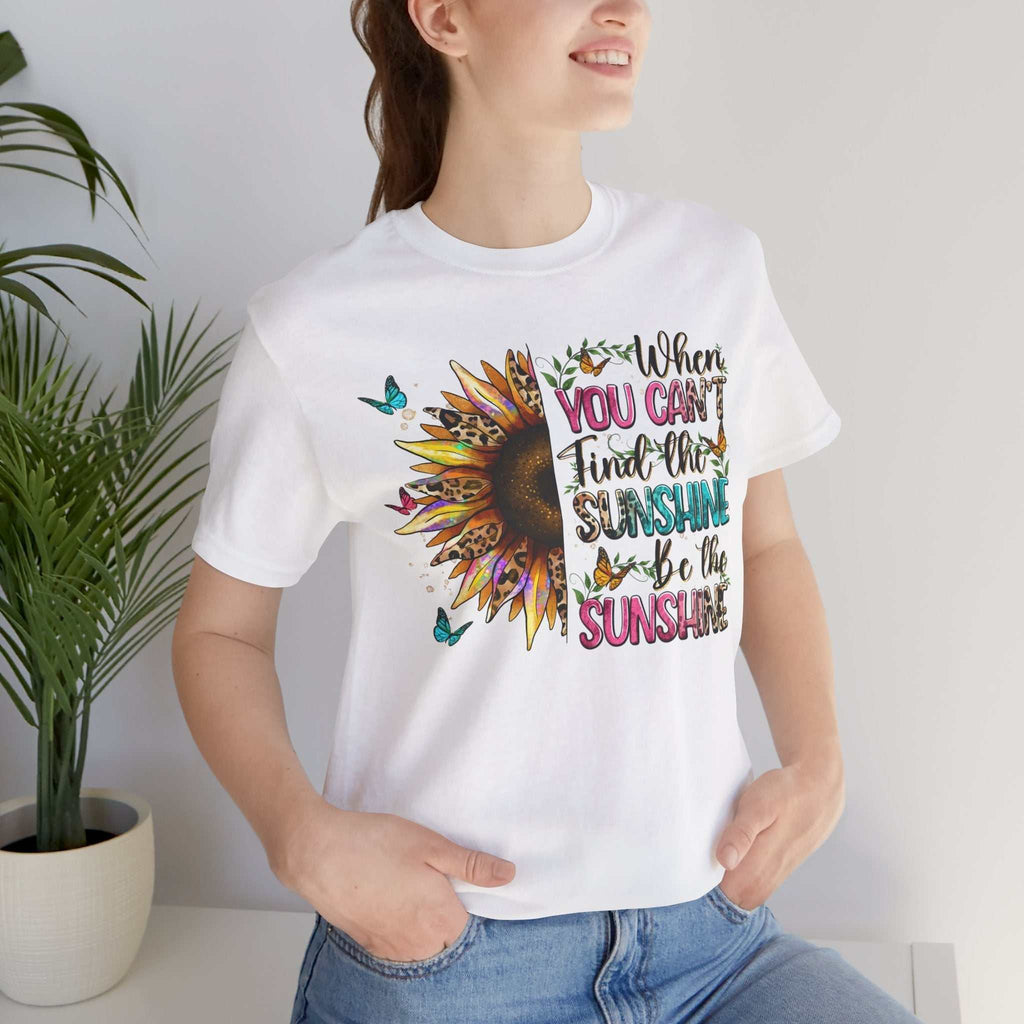 woman wearing white Sunshine Quote Tee with sunflower and colorful positive message print