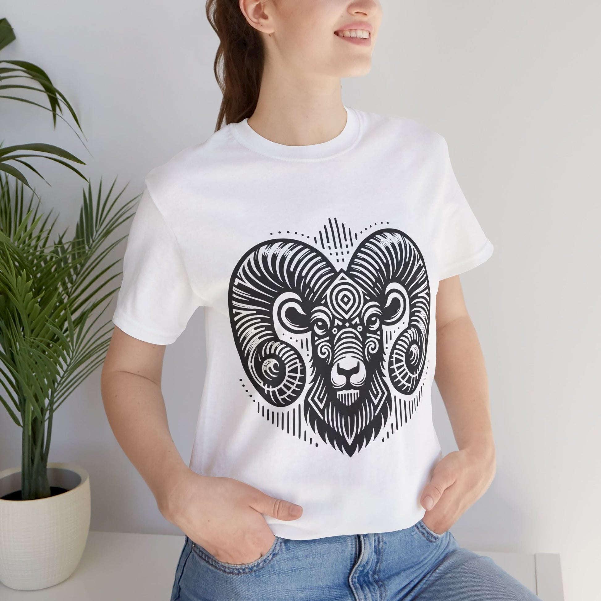Striking tee with an intricate black tribal ram design, offered in vibrant color options