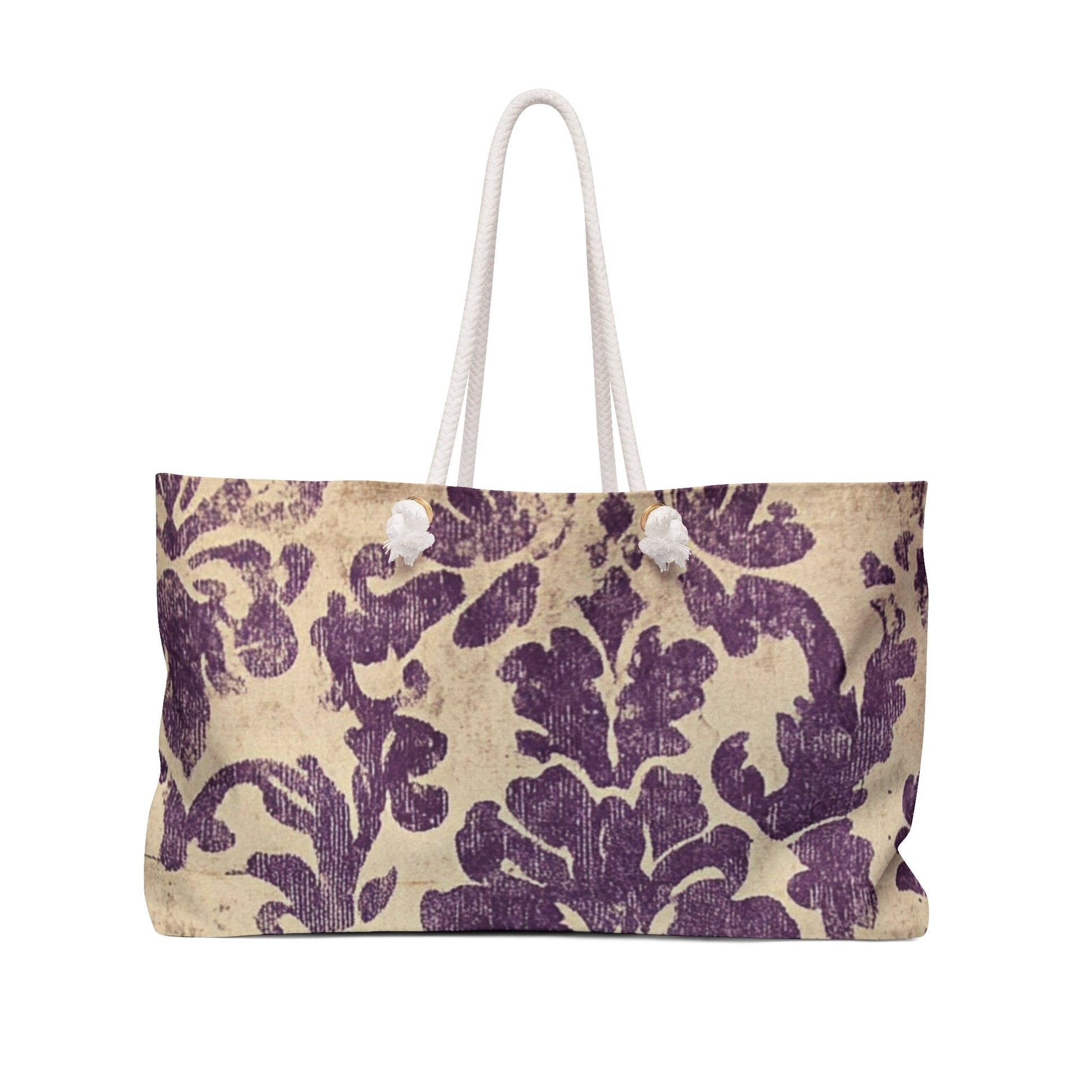 Elegant Damask Weekender Bag with purple floral pattern and white rope handles for stylish travel.