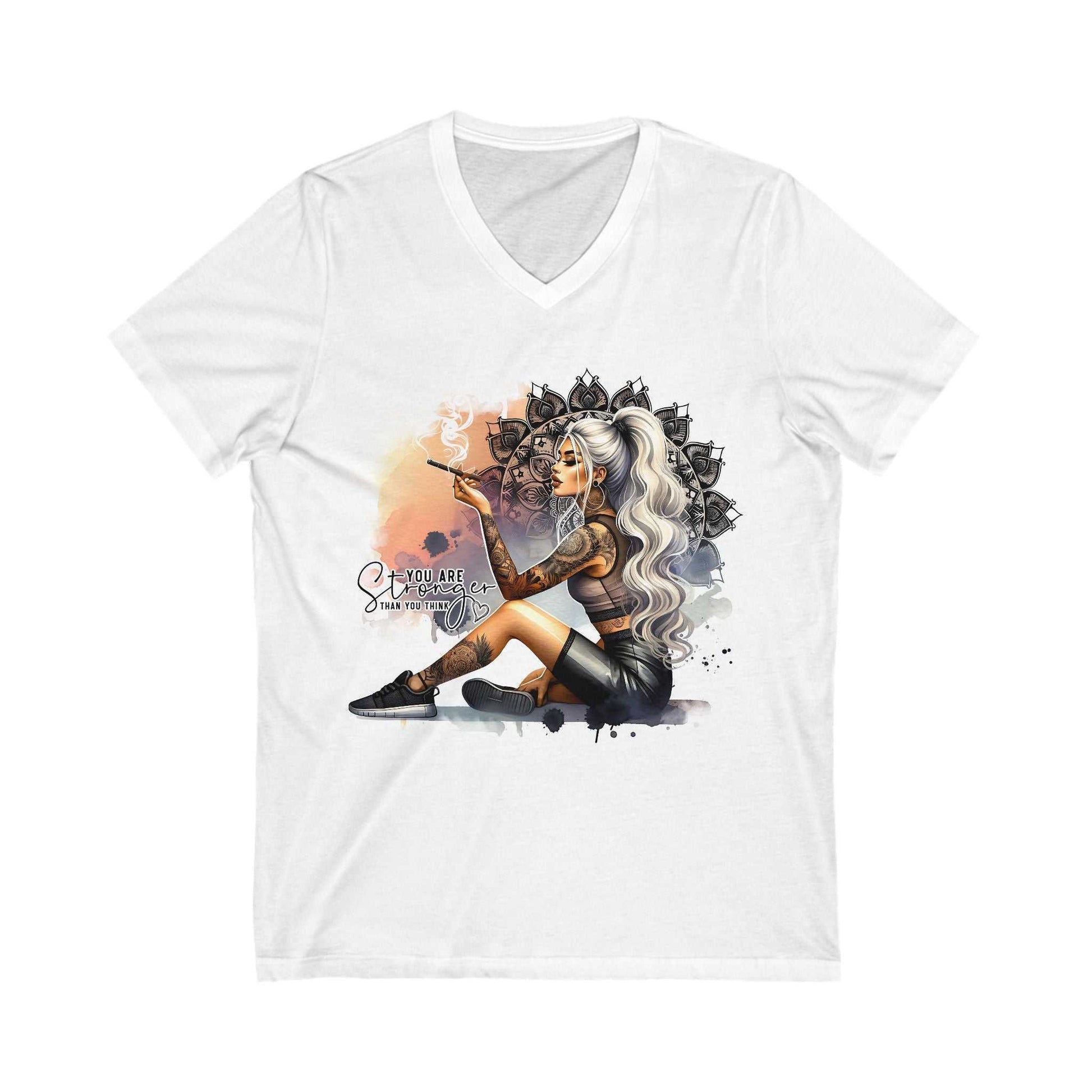 White V-neck t-shirt with "YOU ARE STRONGER" graphic featuring a tattooed woman with long silver hair sitting and smoking, styled with artistic background.