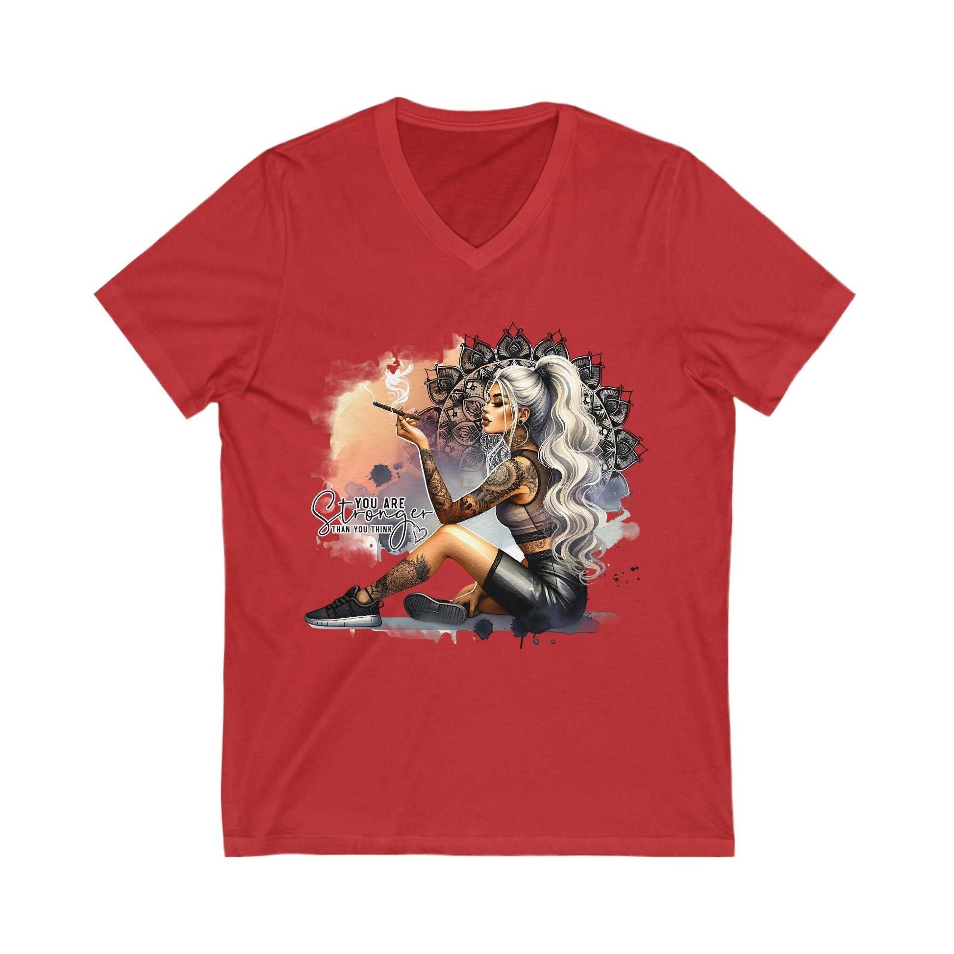 Red unisex V-neck t-shirt with "YOU ARE STRONGER" graphic featuring a tattooed woman with long white hair sitting and releasing a butterfly.