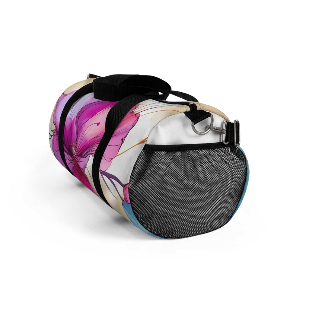 Floral duffel bag with vibrant pink flower design, black handles, mesh side pocket, and adjustable strap for gym or travel use