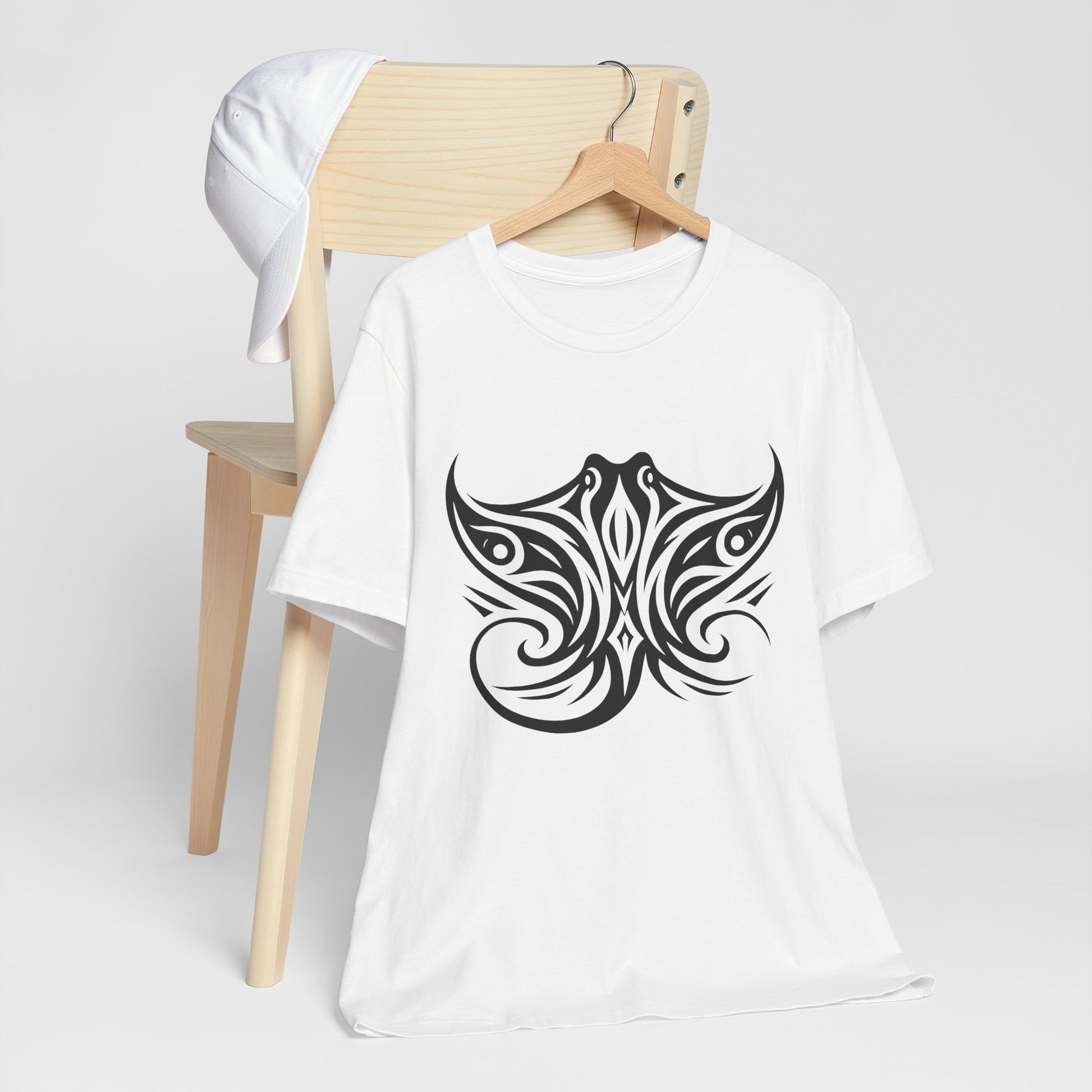 Tribal Manta Ray Tee – Bold Ocean Spirit Art on Sand-Colored Shirt