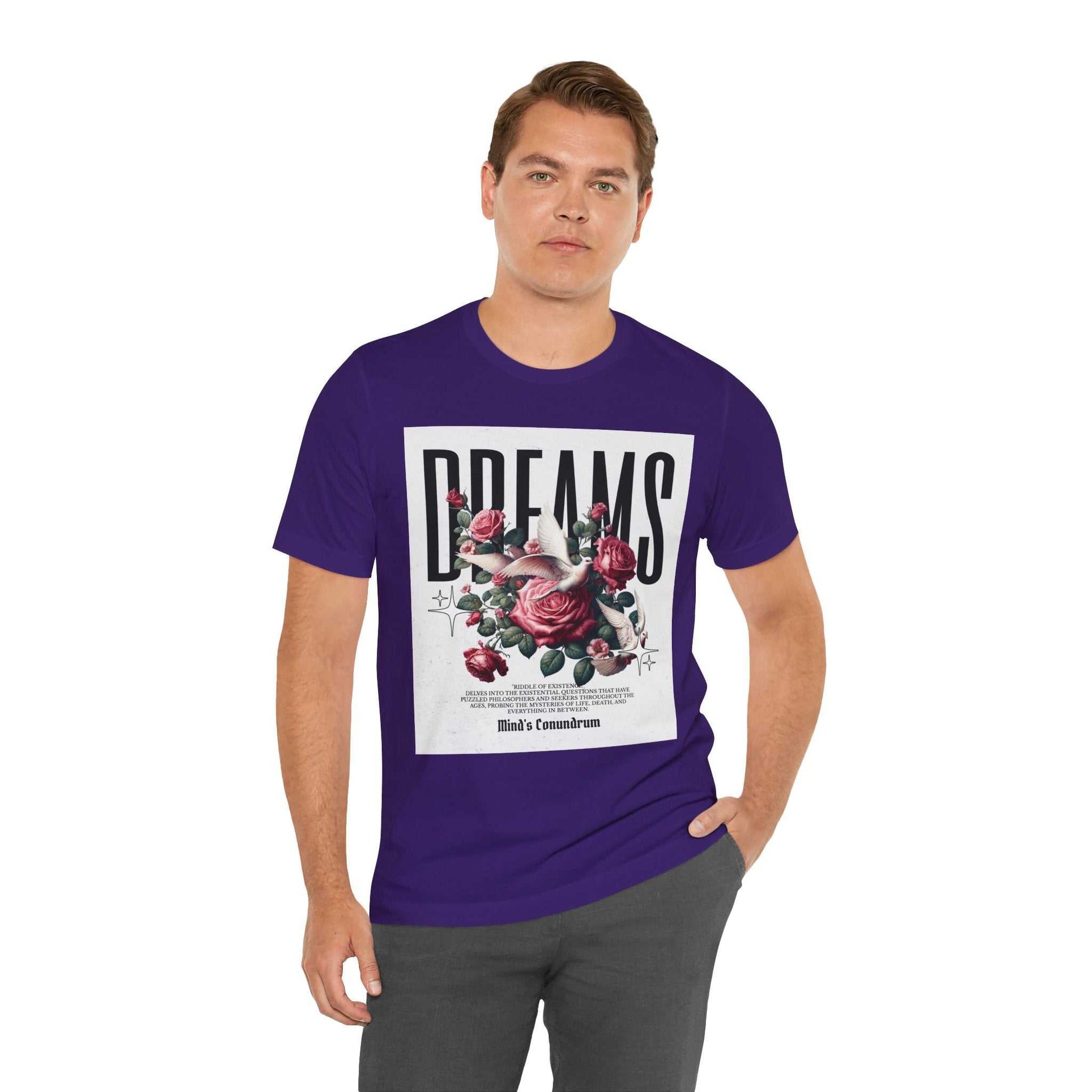 Man wearing purple Dreams Floral Tee with rose graphic and bold typography on front