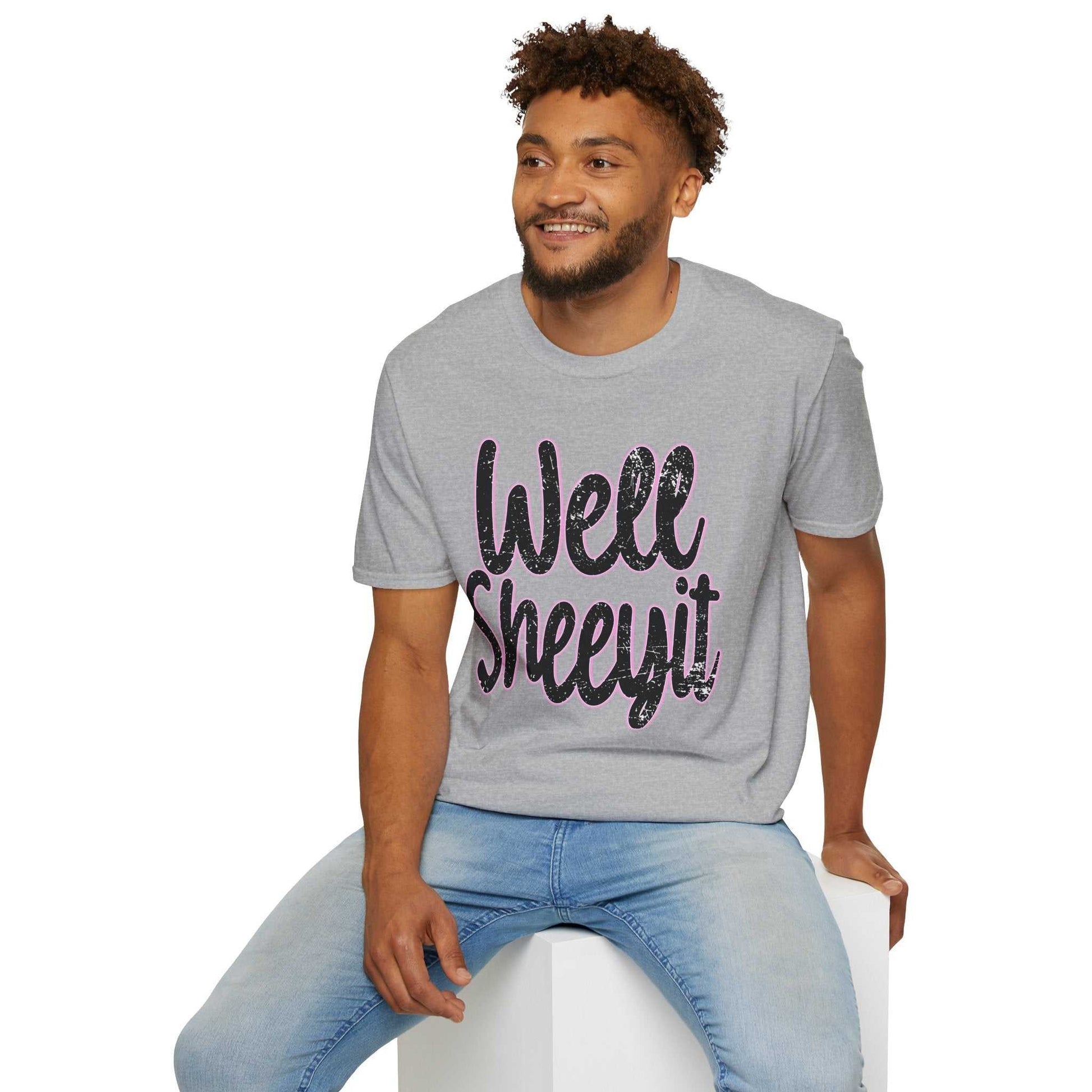 Man wearing a grey casual statement tee with "Well Sheeyit" funny quote, paired with light blue jeans.