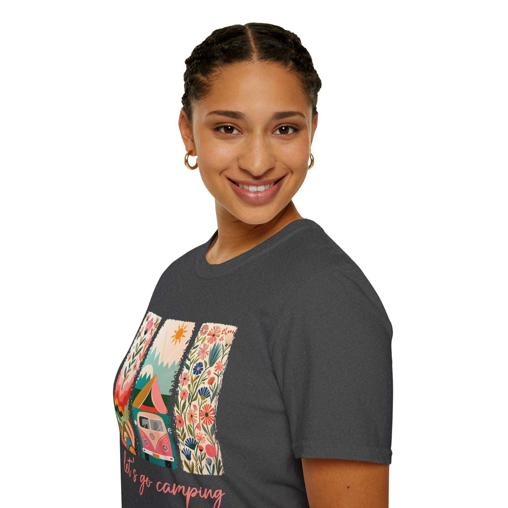 Woman wearing a unisex softstyle t-shirt with colorful camping-themed graphic design and short sleeves