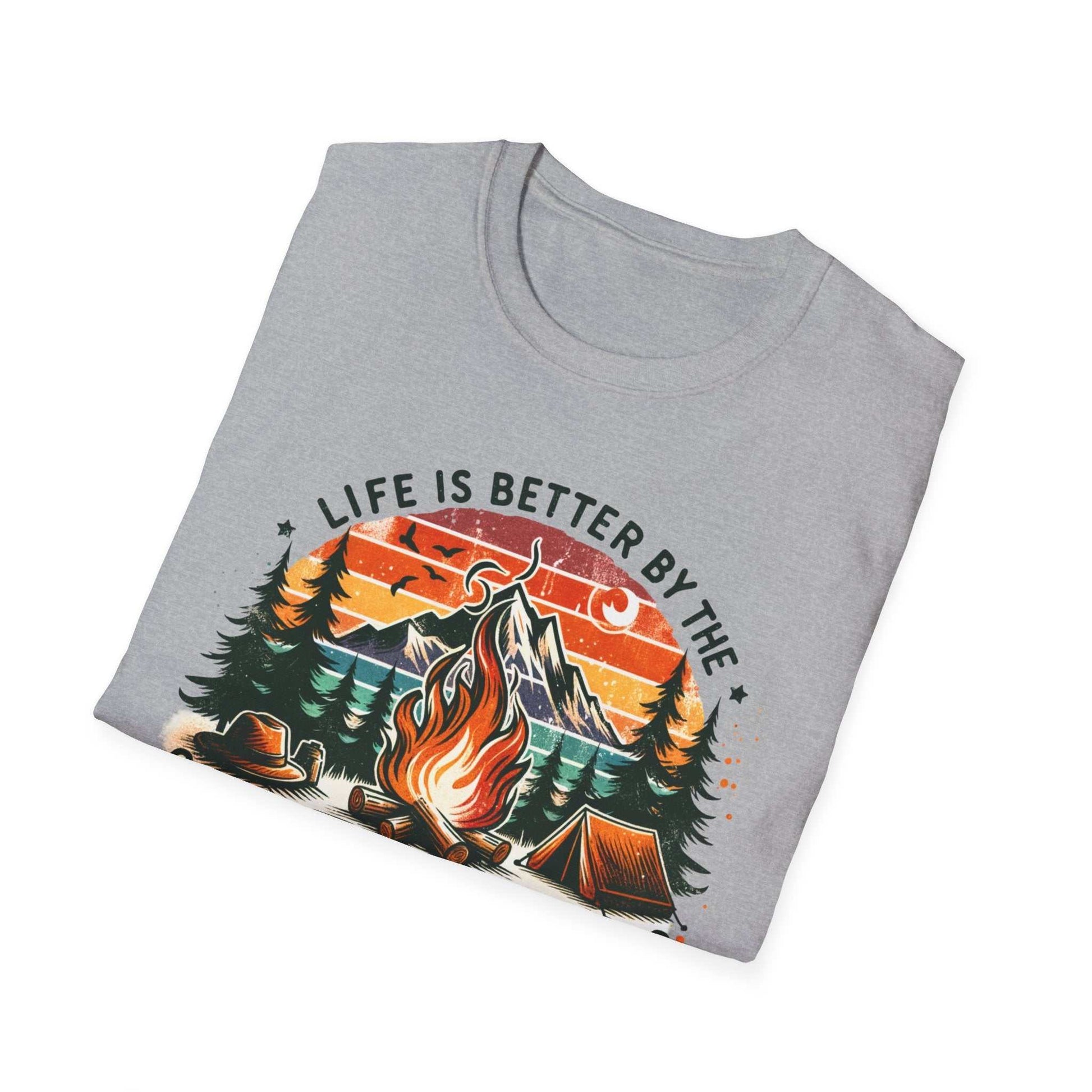 Camping Adventure Unisex T-Shirt with campfire, mountains, and trees graphic and "Life is Better by the Campfire" text on grey cotton fabric
