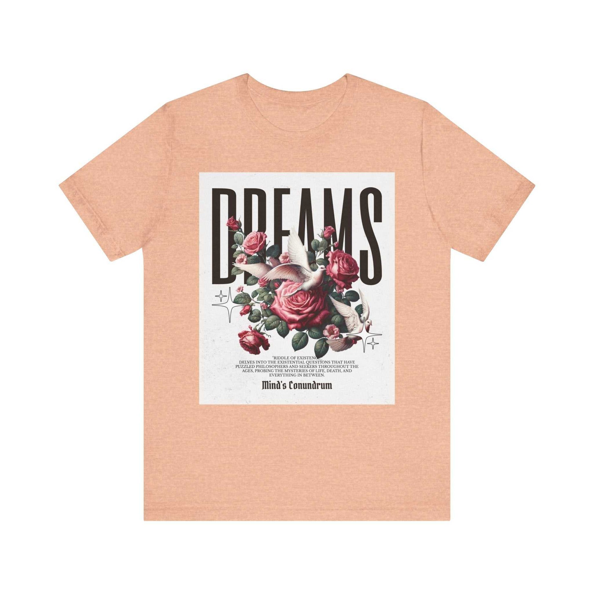 Unisex peach Dreams Floral Tee with bold typography and floral graphic design on the front.