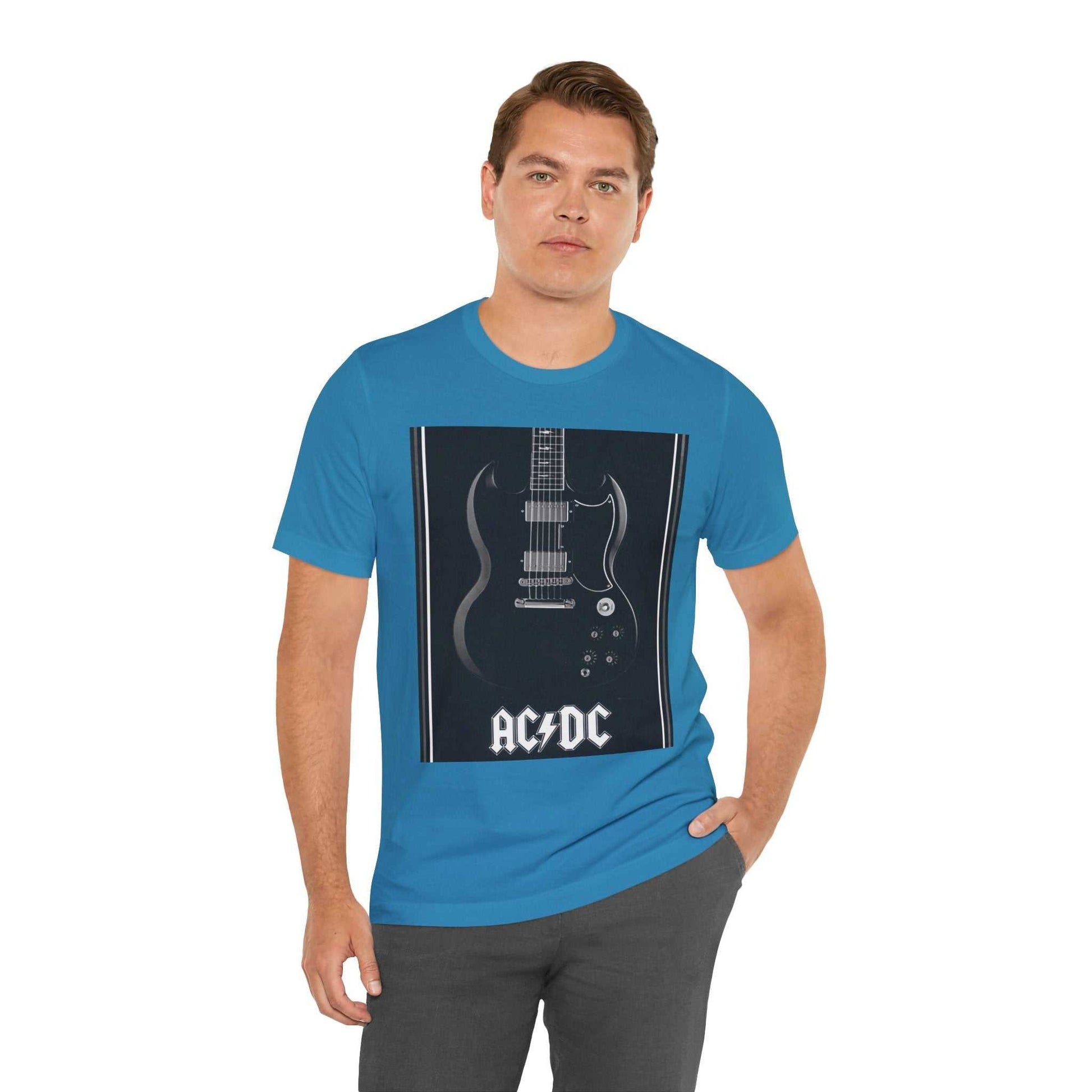 Man wearing blue rock guitar graphic tee with AC/DC design and black guitar illustration on front