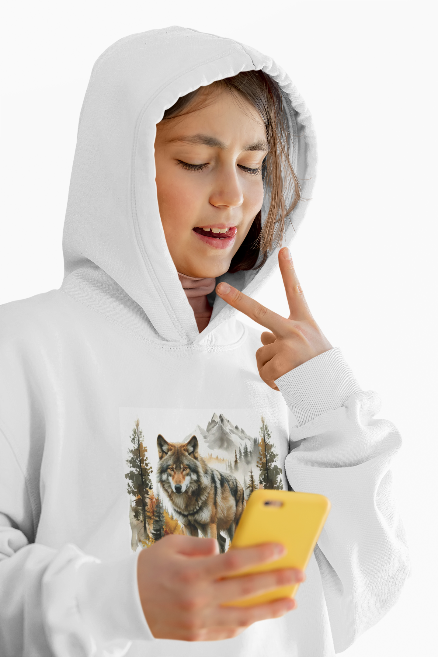 White Wilderness Wolf Hoodie with wolf and mountain design worn by woman using phone