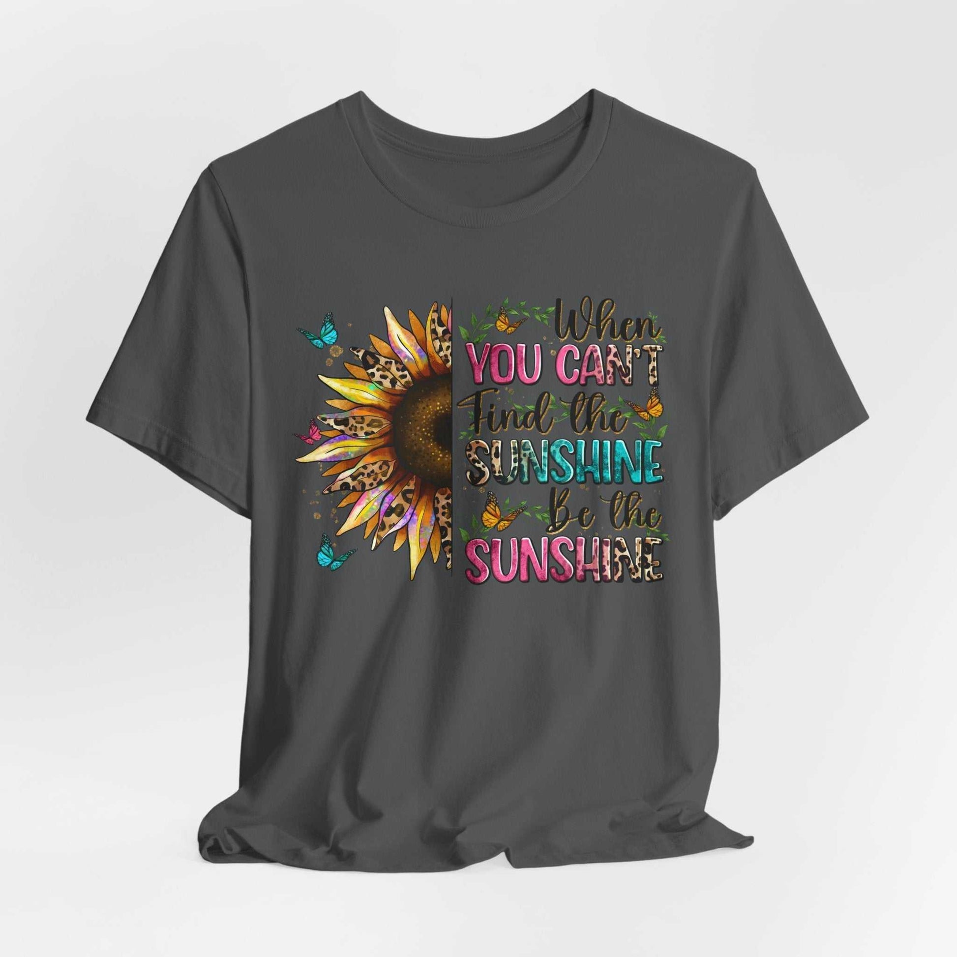Dark grey Sunshine Quote Tee with vibrant sunflower and colorful inspirational text design