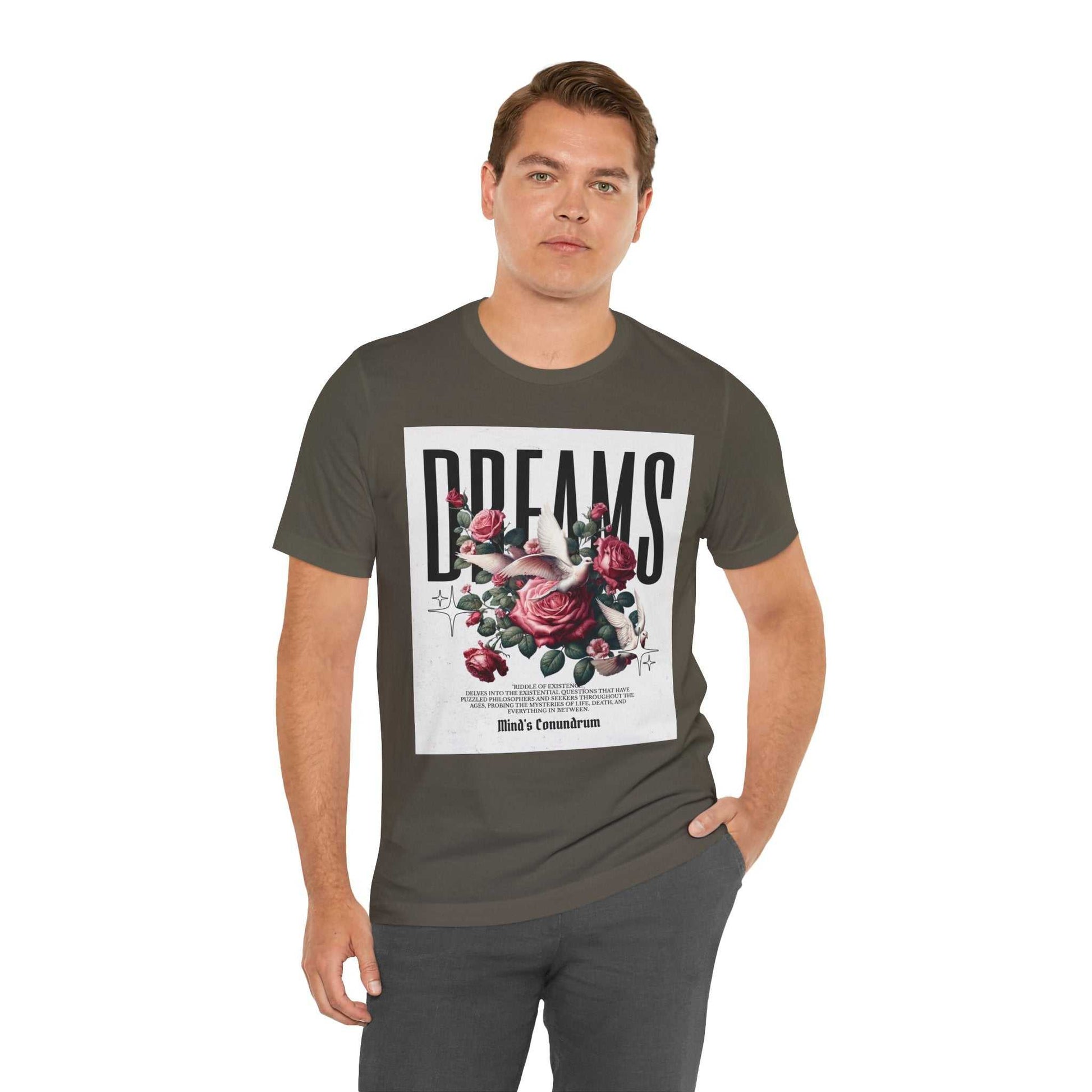 Man wearing a dark short sleeve Dreams Floral Tee with bold typography and floral graphic on front