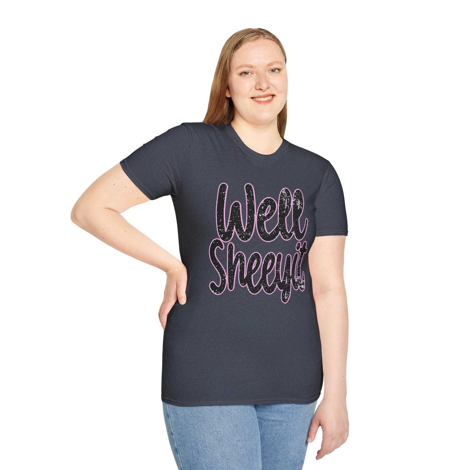 Woman wearing navy casual statement tee with funny "Well Sheeyit" quote across the front
