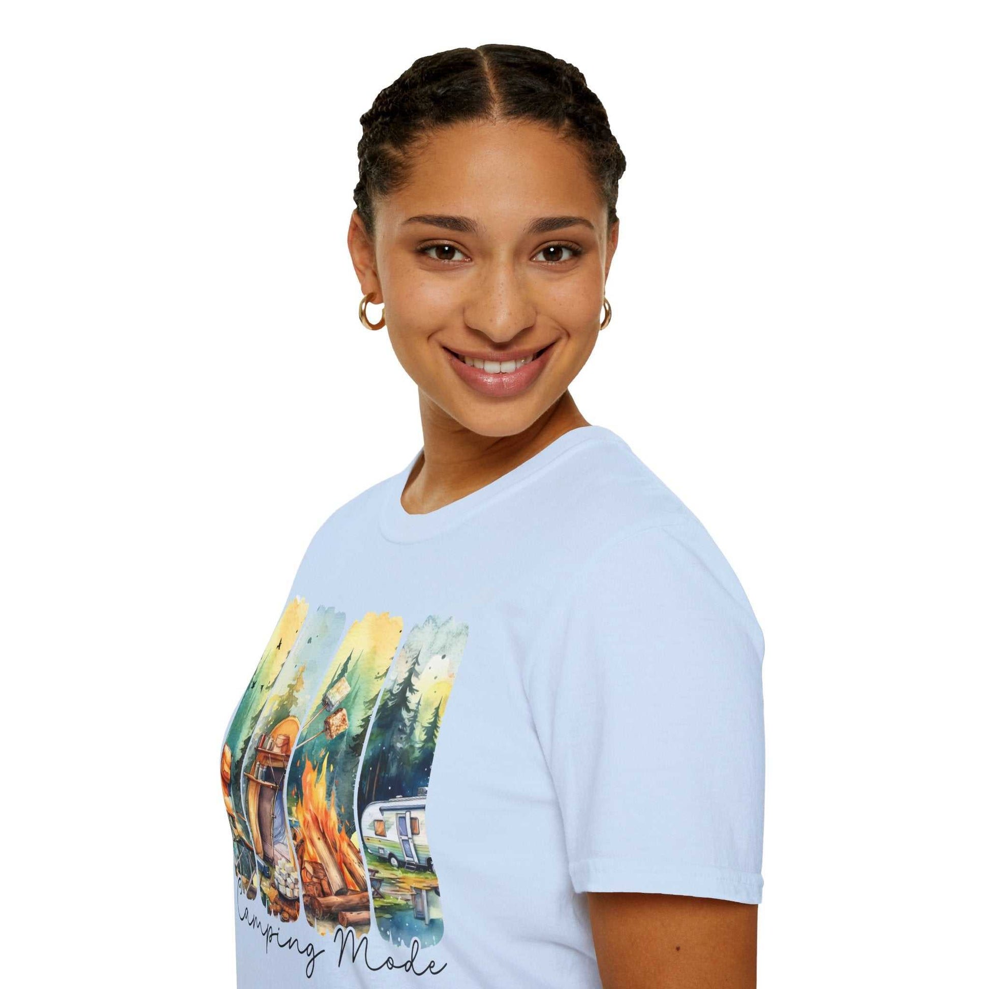 Smiling woman wearing light blue Camping Adventure Unisex T-Shirt with colorful camping scene print