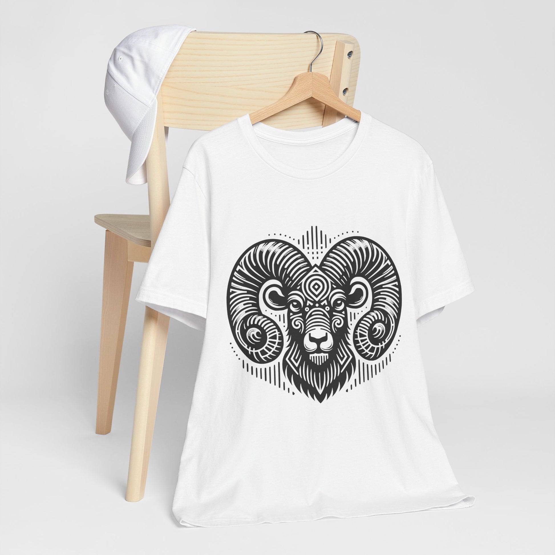Striking tee with an intricate black tribal ram design, offered in vibrant color options