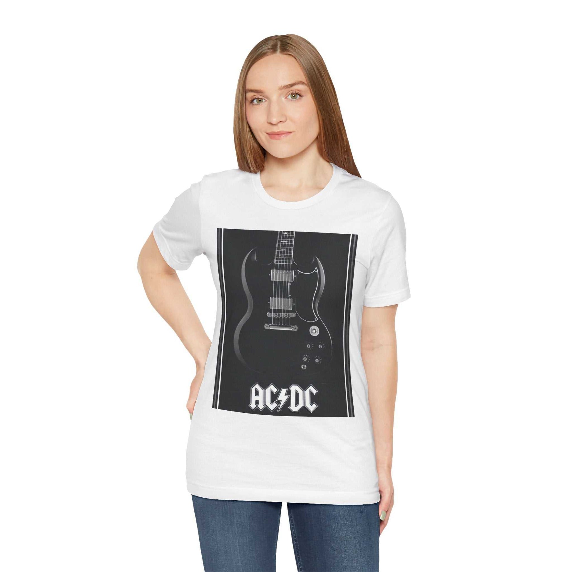 Woman wearing white rock guitar graphic tee with AC/DC print and blue jeans