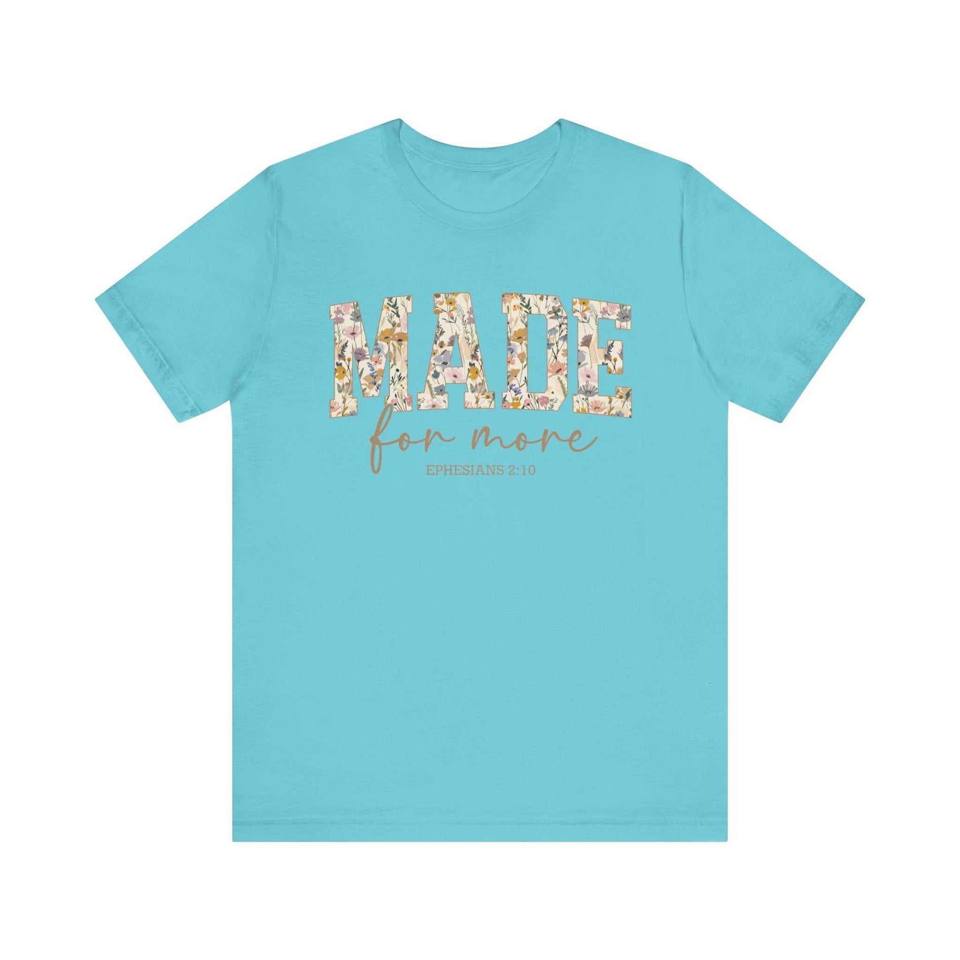 Blue "Made for More" unisex jersey short sleeve tee with floral text design and comfortable fit