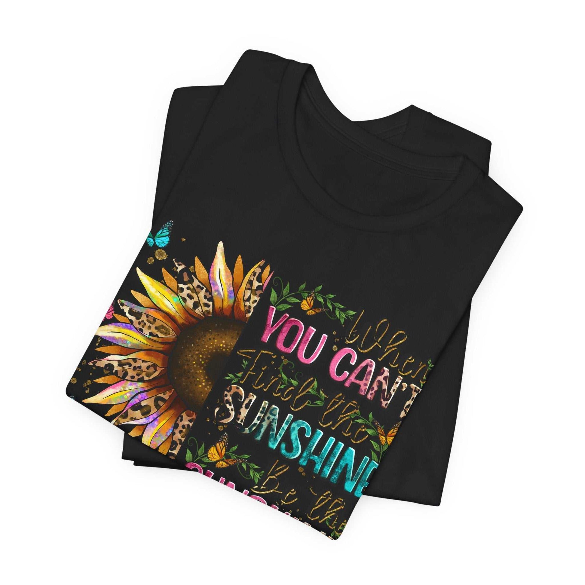 Black Sunshine Quote Tee with vibrant sunflower and motivational text design, made from soft breathable cotton.