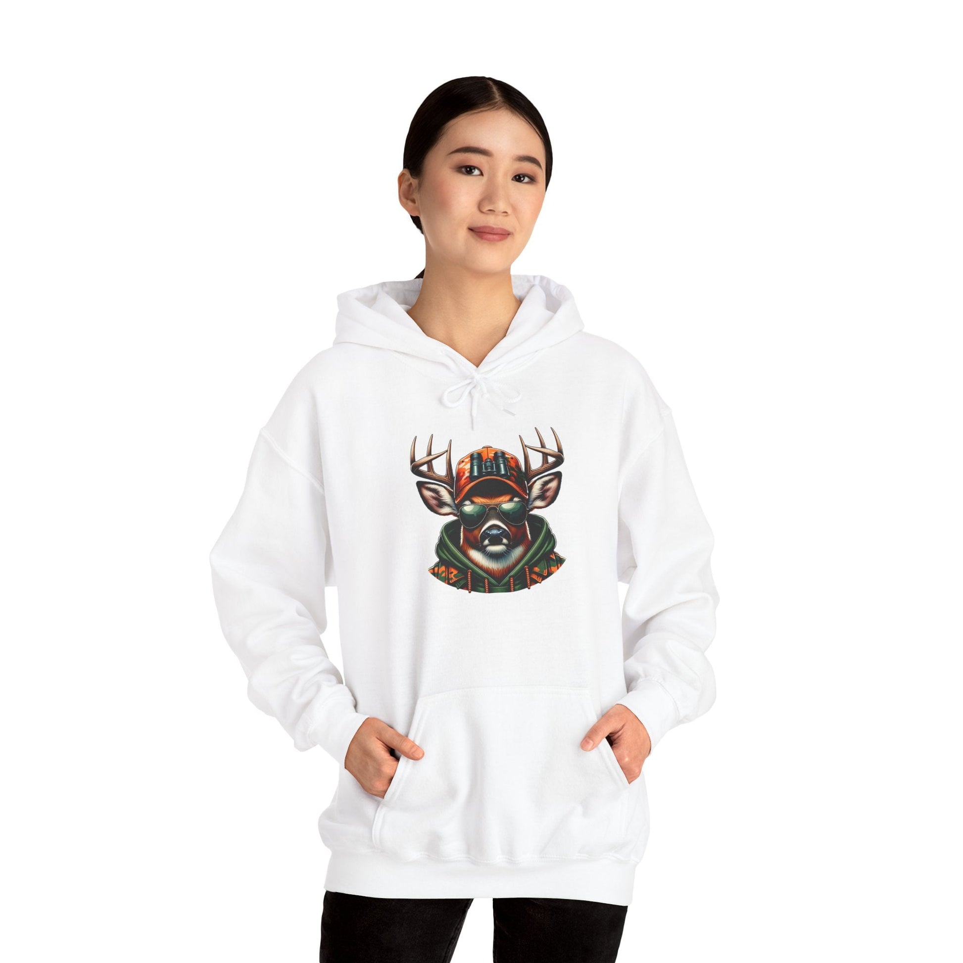 White hooded sweatshirt featuring a bold deer design worn by a model with hands in kangaroo pocket.