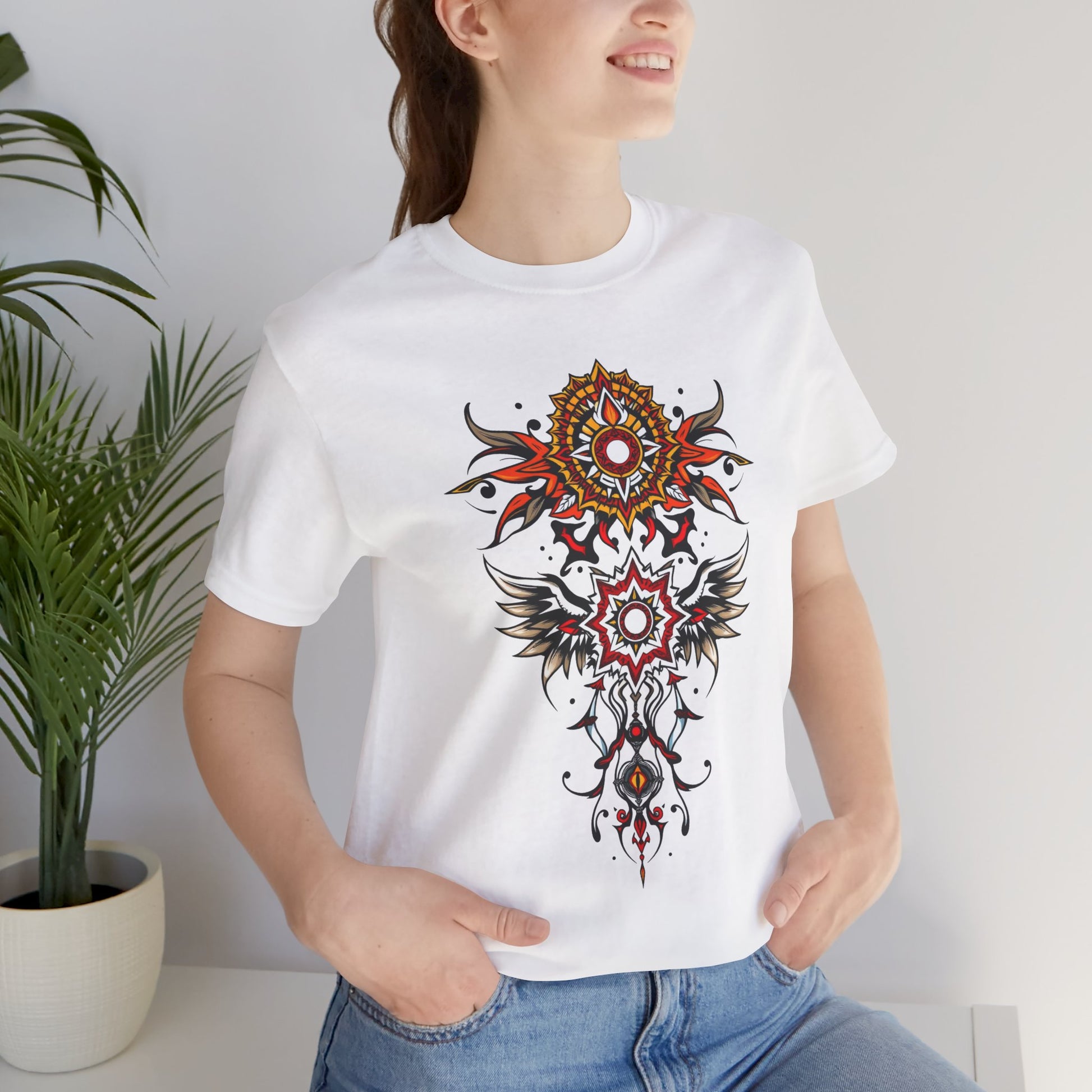 Turn heads in this tee, available in vibrant colors, showcasing a fiery red and gold tribal mandala for bold, artistic style