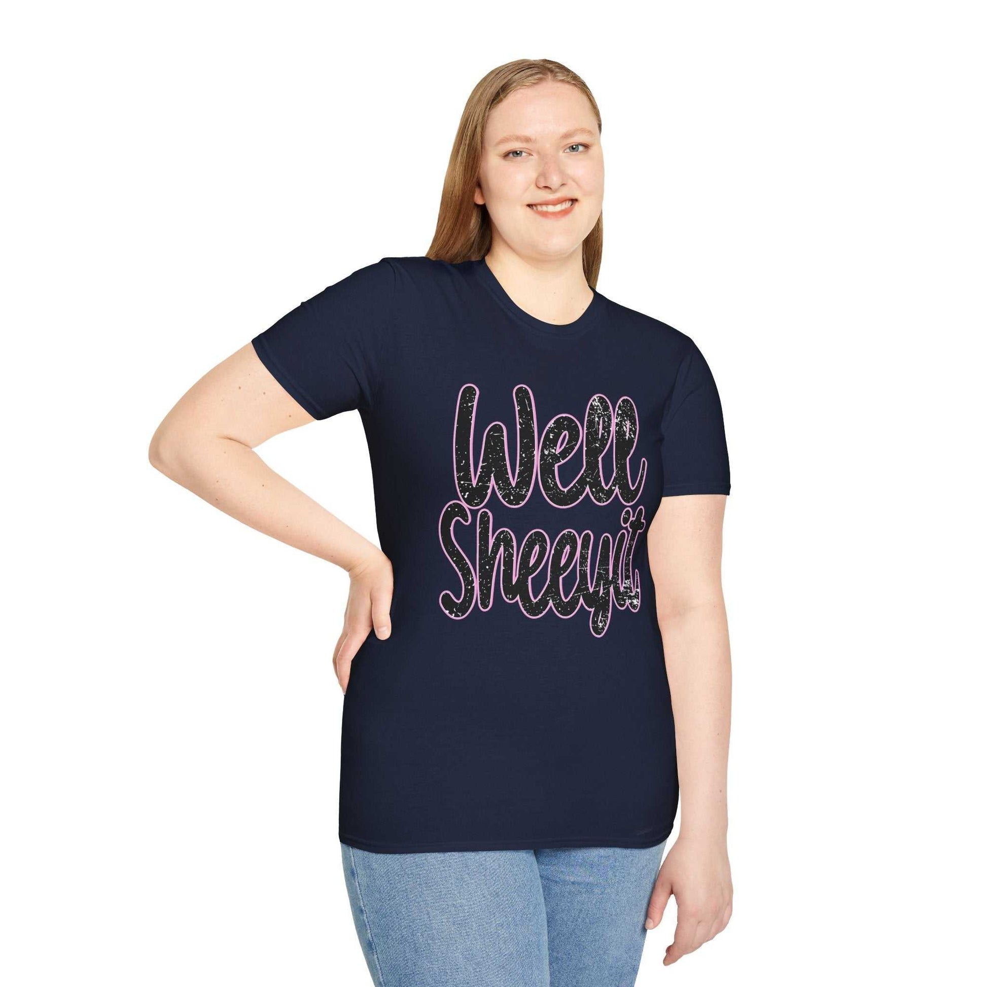 Woman wearing navy casual statement tee with "Well Sheeyit" funny quote, paired with jeans