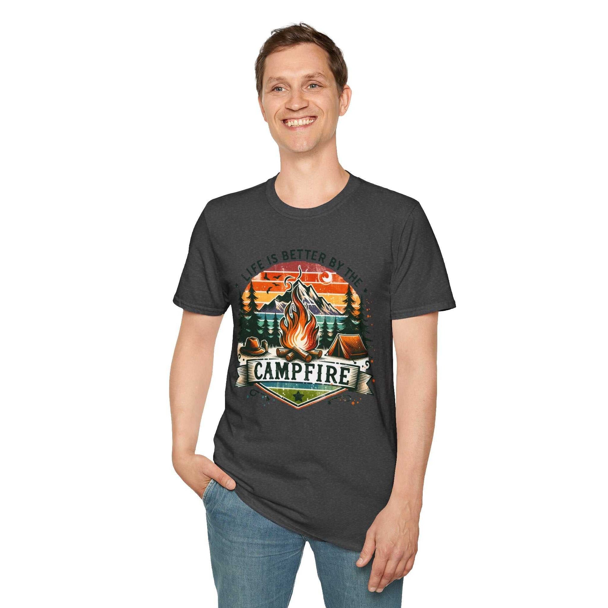 Man wearing a dark gray Camping Adventure Unisex T-Shirt with a colorful campfire design and "Life is better by the campfire" text.