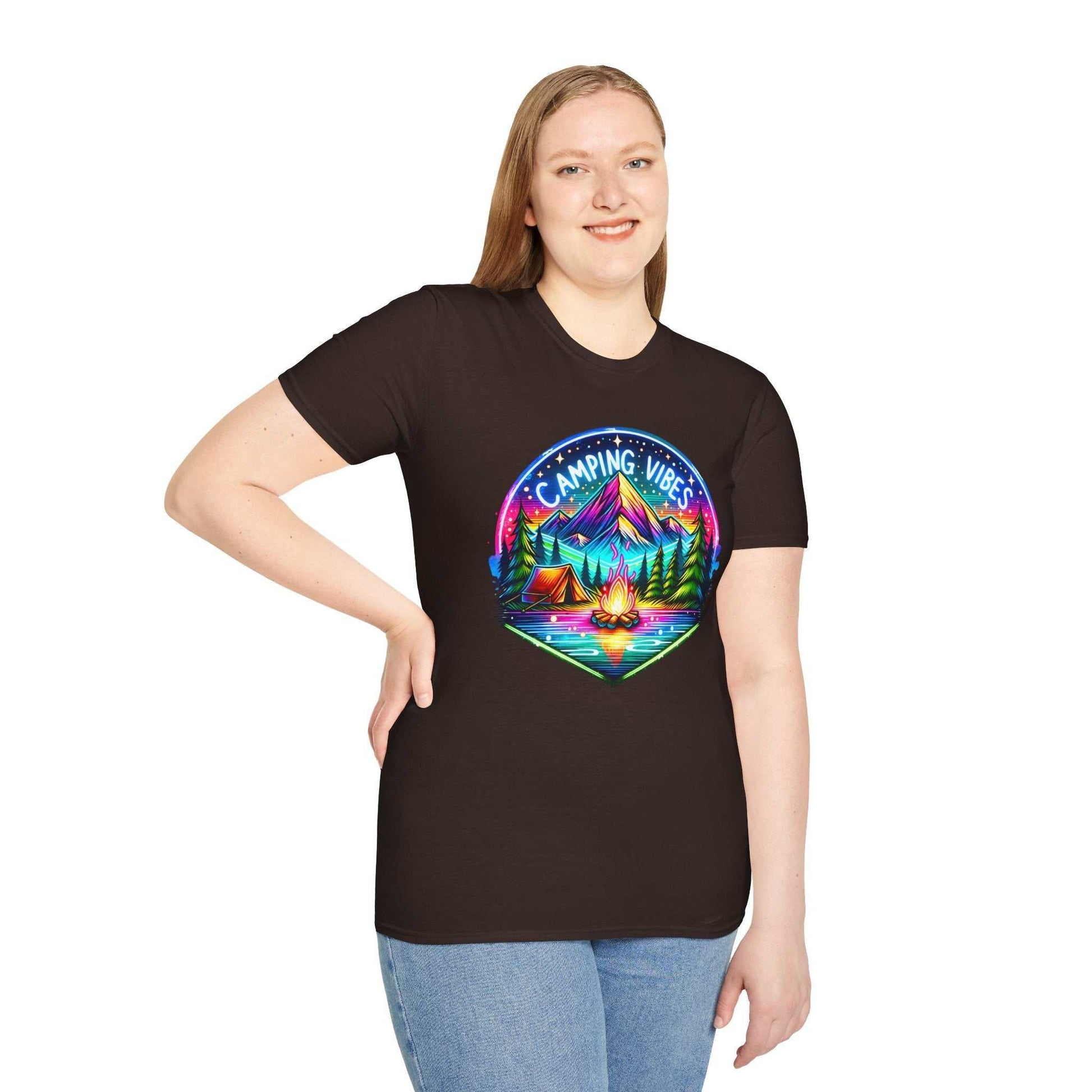 Woman wearing black Camping Vibes Unisex Softstyle T-Shirt with colorful camping graphic and mountains
