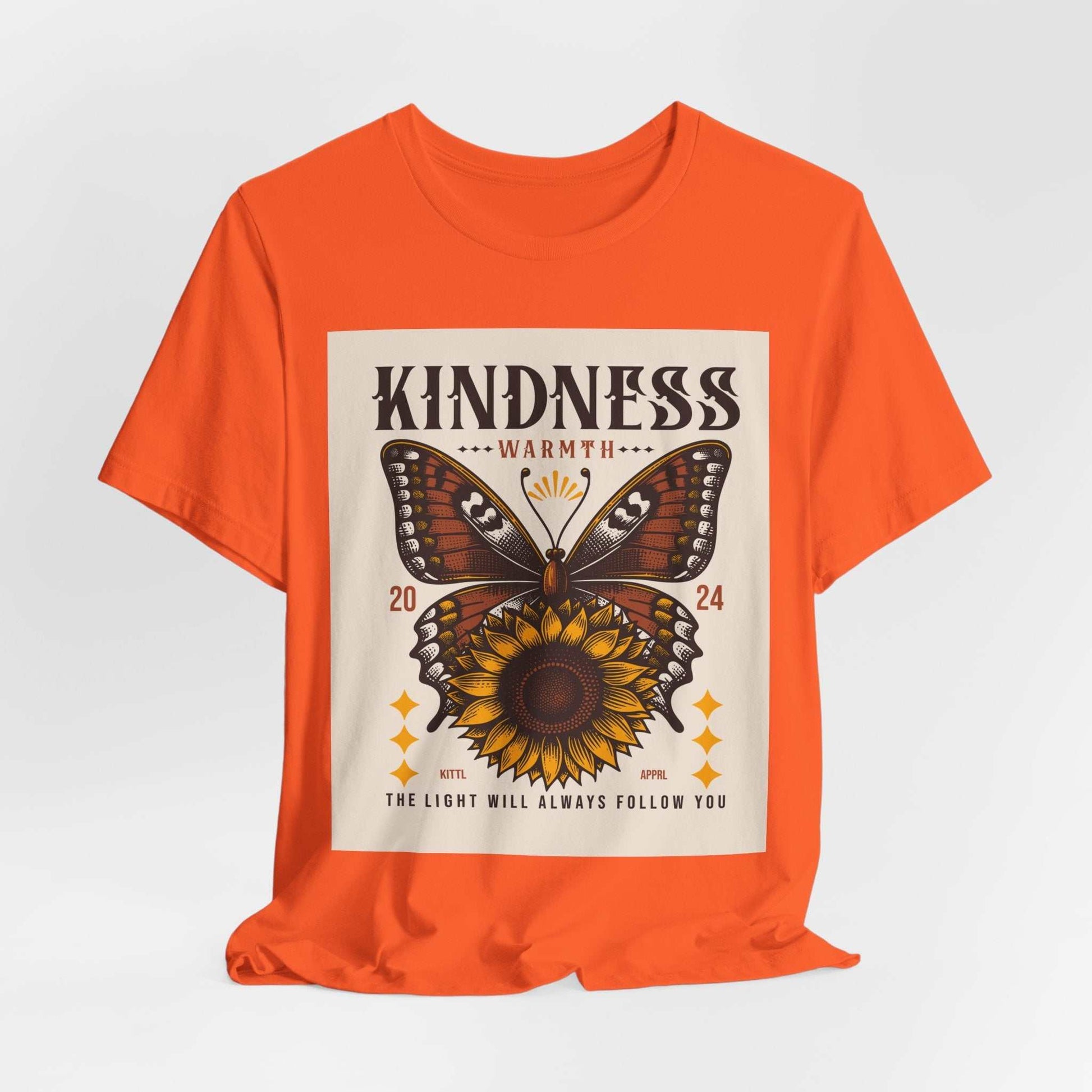 Orange Kindness Butterfly Tee with sunflower and butterfly graphic design and positive message.