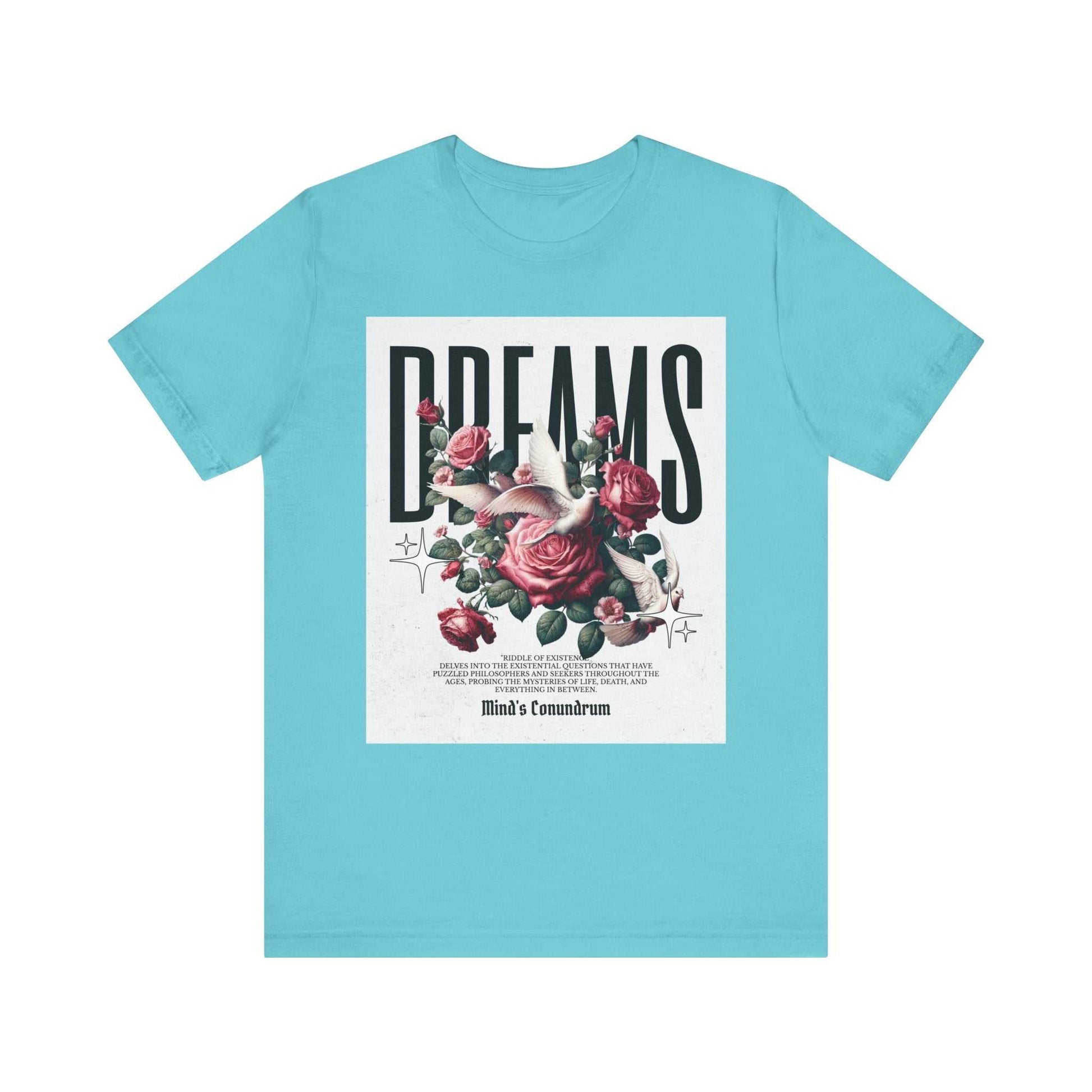 Light blue Dreams Floral Tee with a bold graphic of roses, a bird, and Helvetica-style text on the front