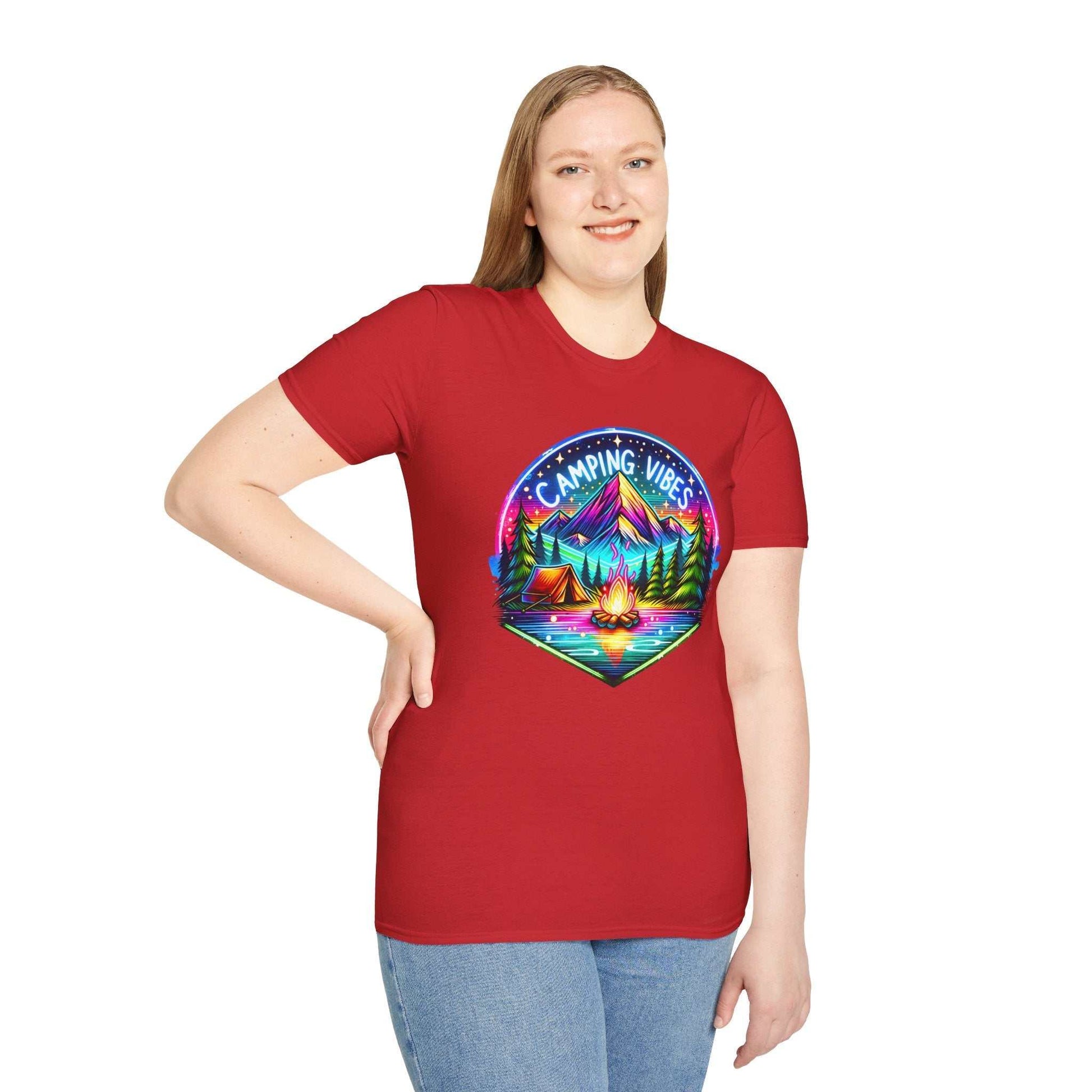 Unisex softstyle red t-shirt featuring a colorful camping vibes graphic with mountains, campfire, and tents.